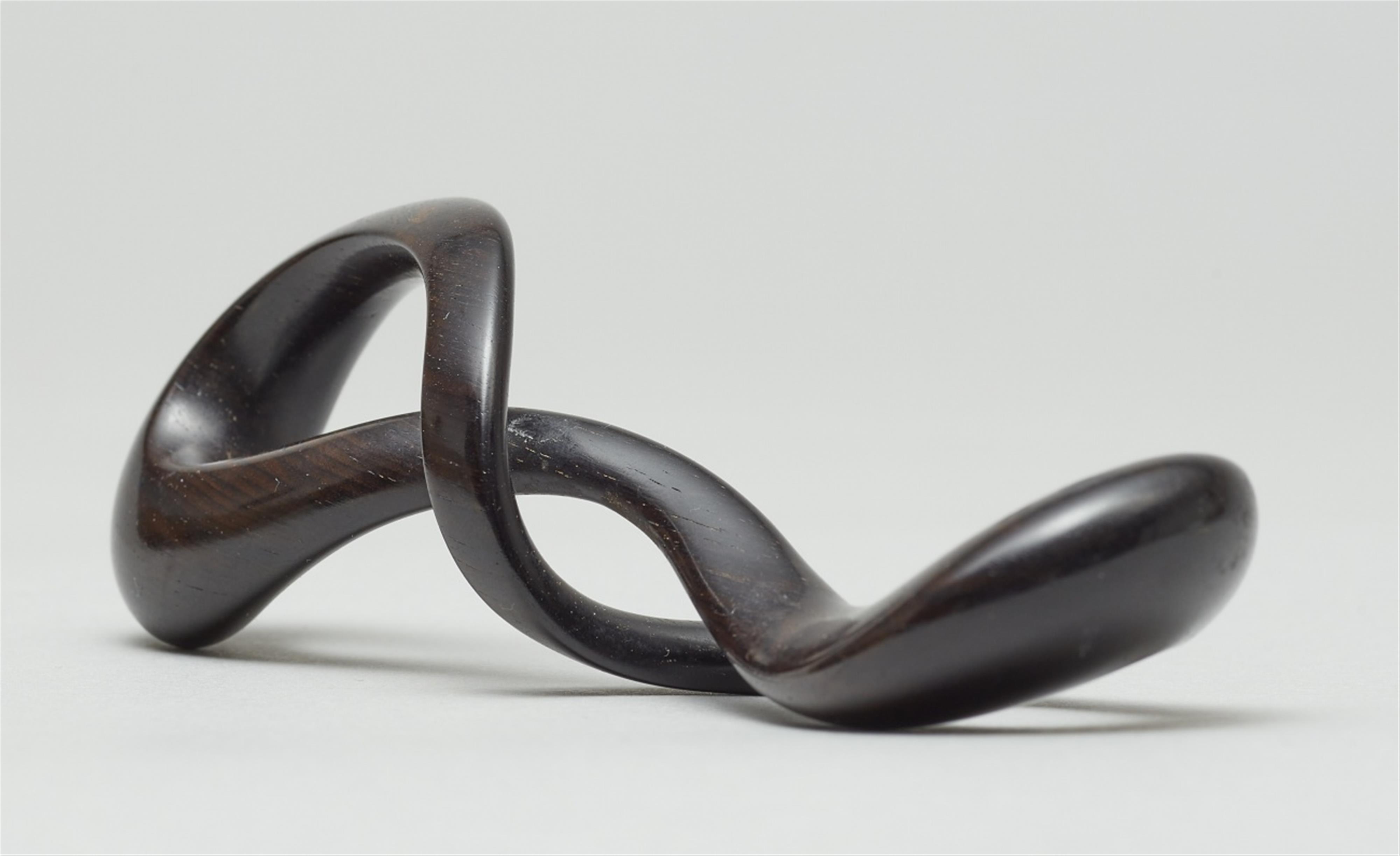 An ebony Moebius strip - image-3