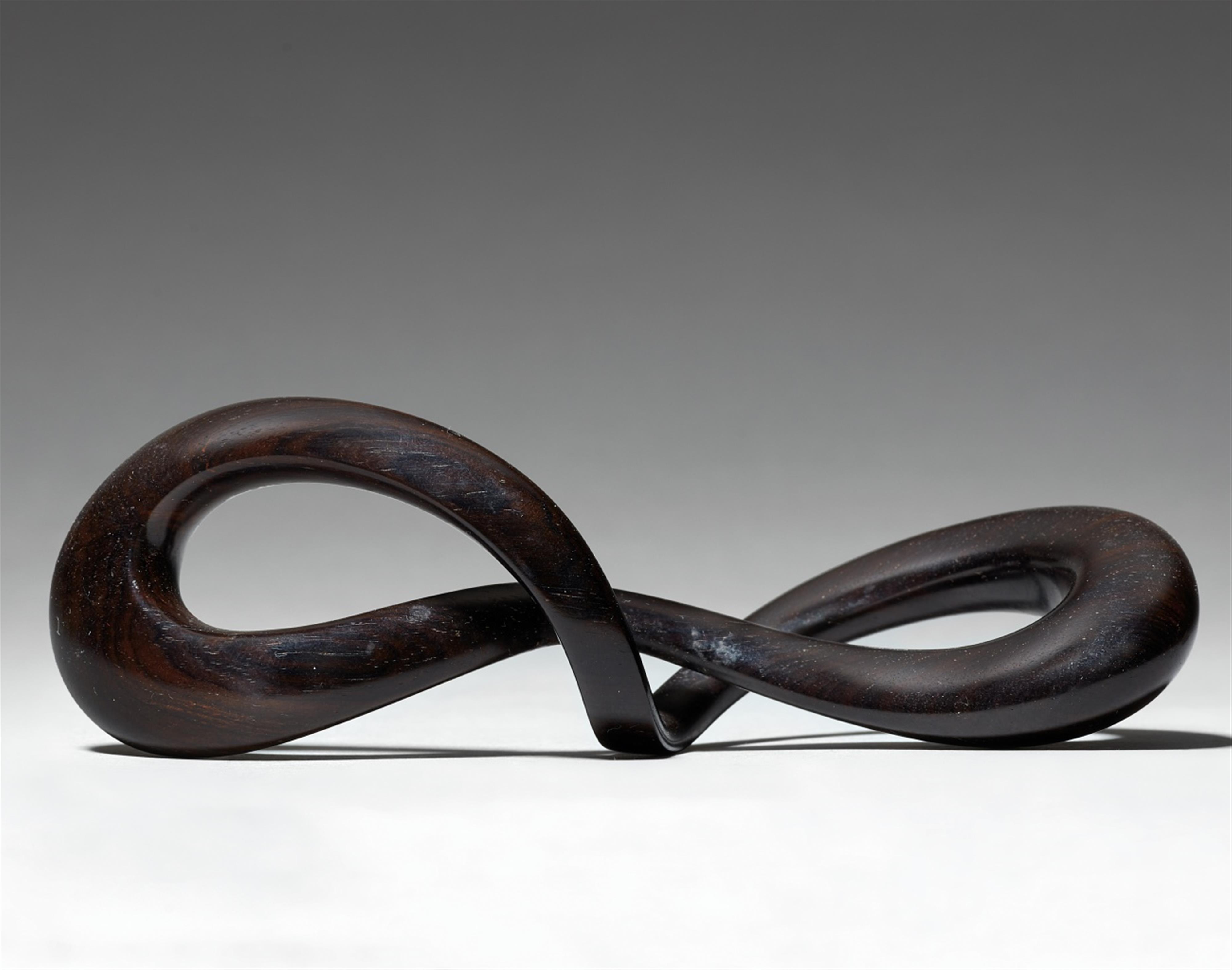 An ebony Moebius strip - image-1