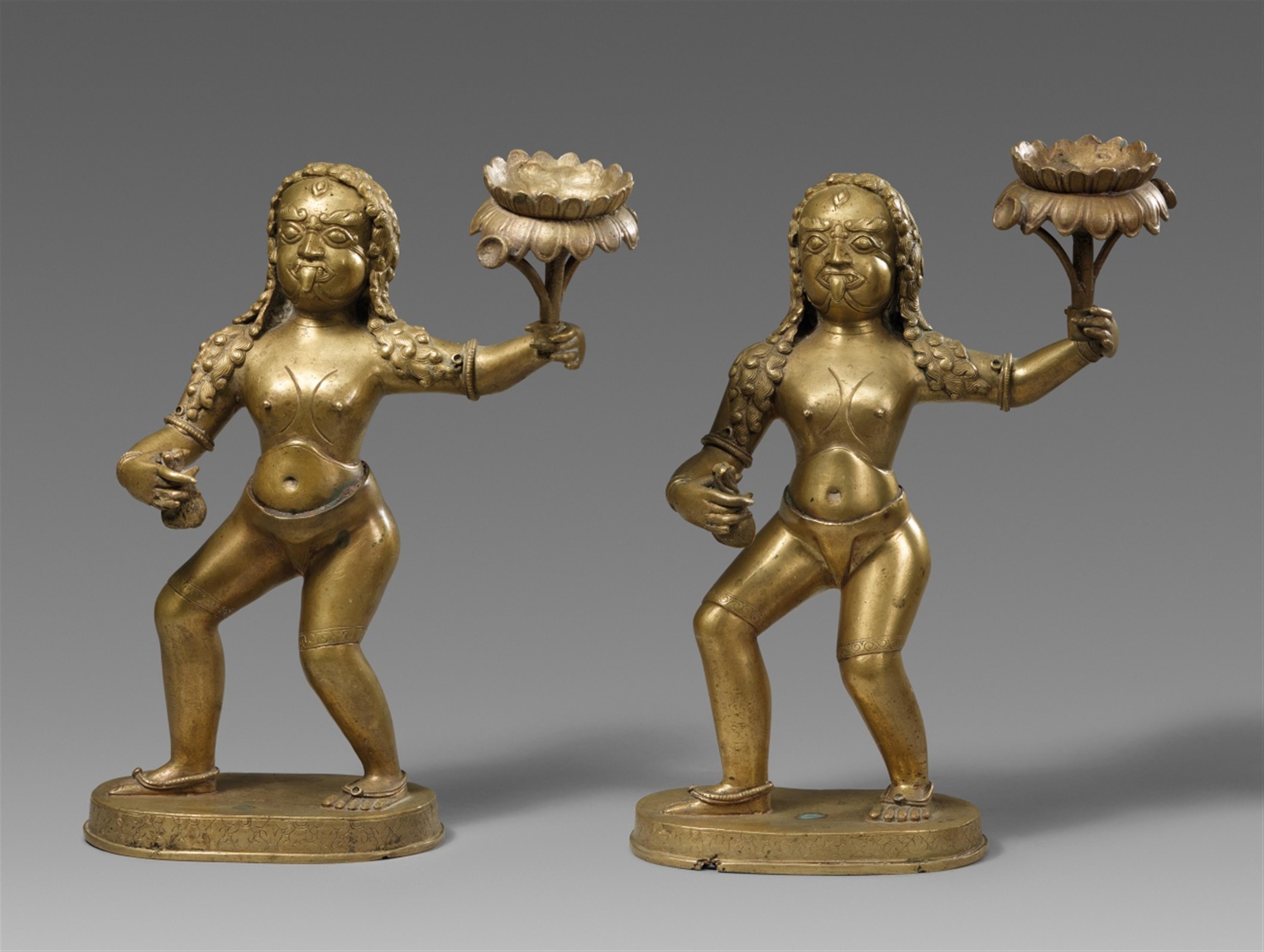 A Tibetan or Bhutanese bronze figure of a pair of demons. 18th/19th century - image-1