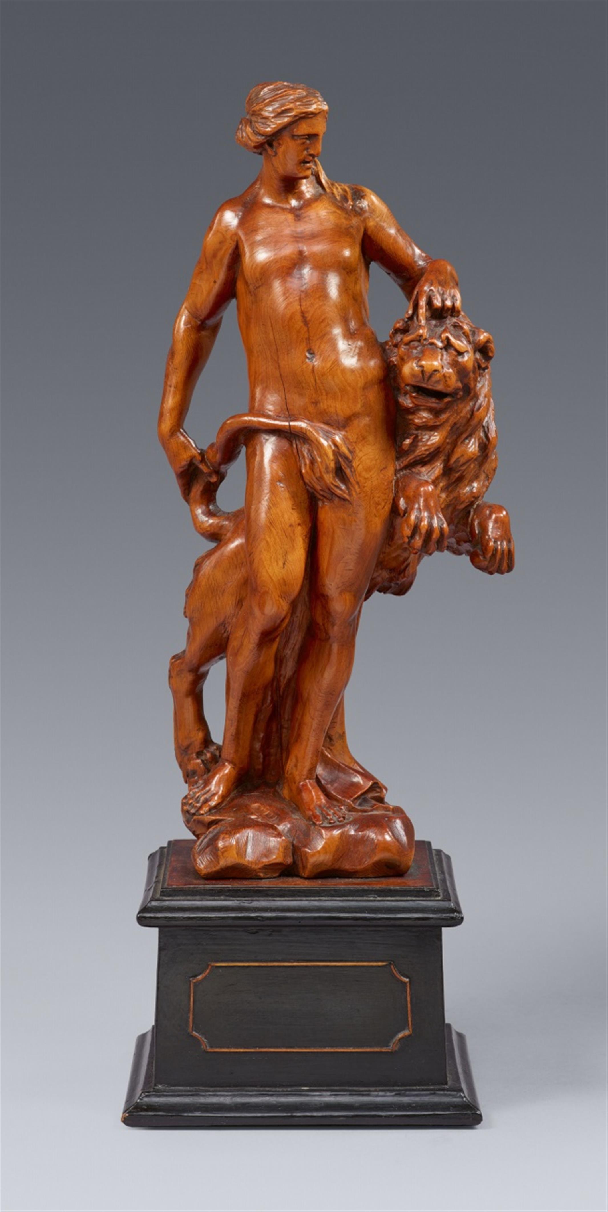 A carved boxwood allegory of strength - image-1