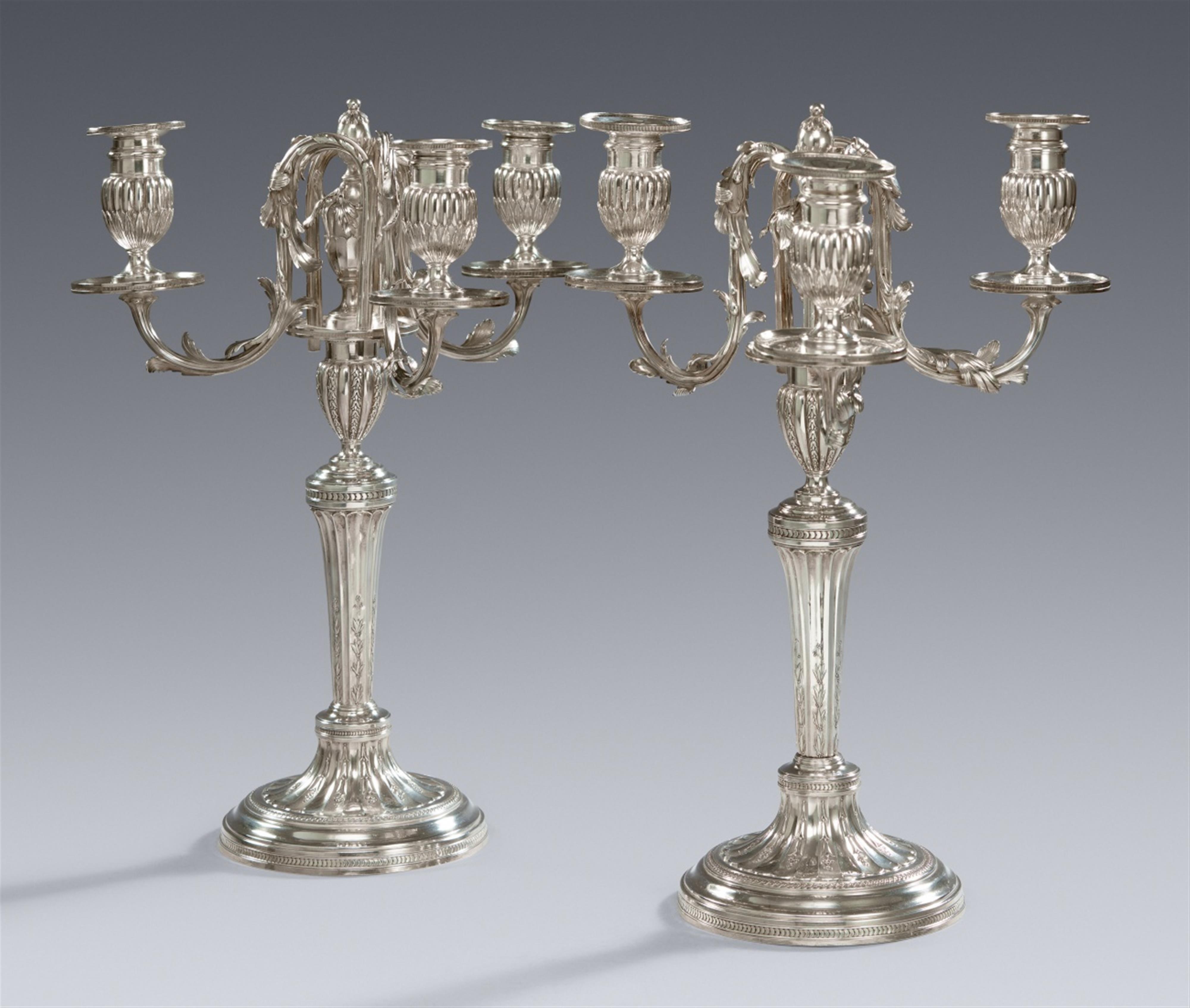 A pair of three-flame Parisian silver candelabra - image-1