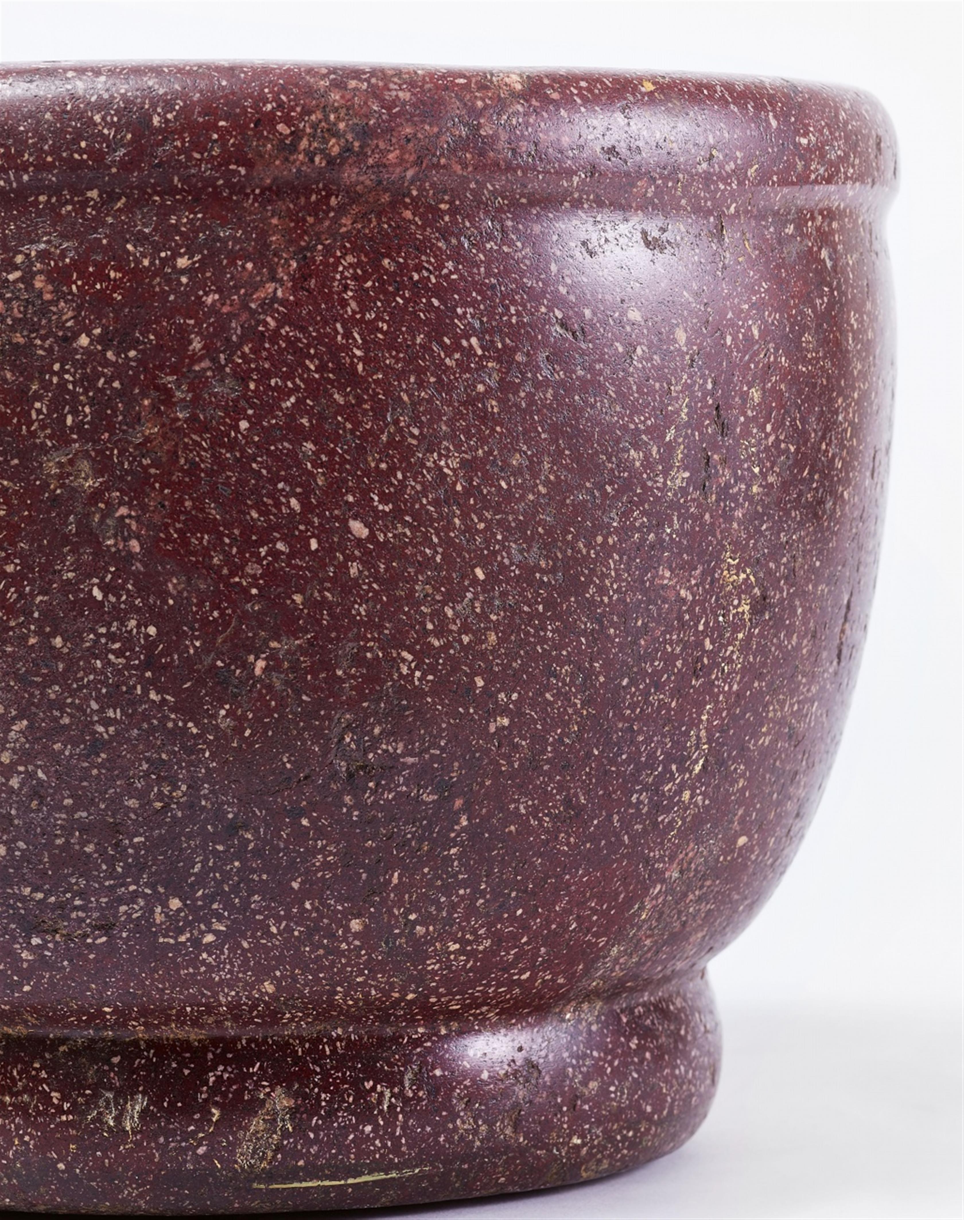 An important red porphyry mortar - image-2