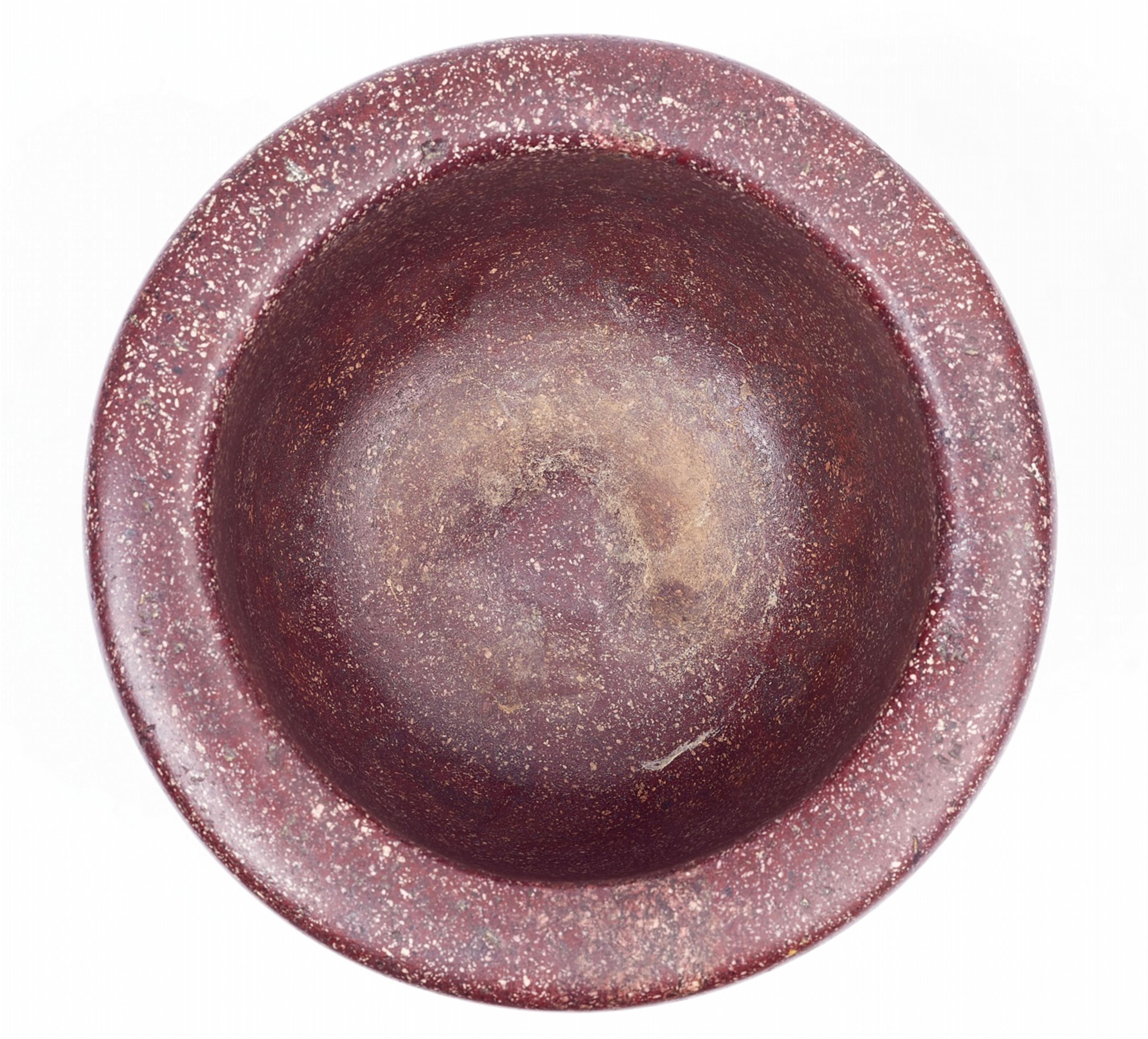 An important red porphyry mortar - image-4