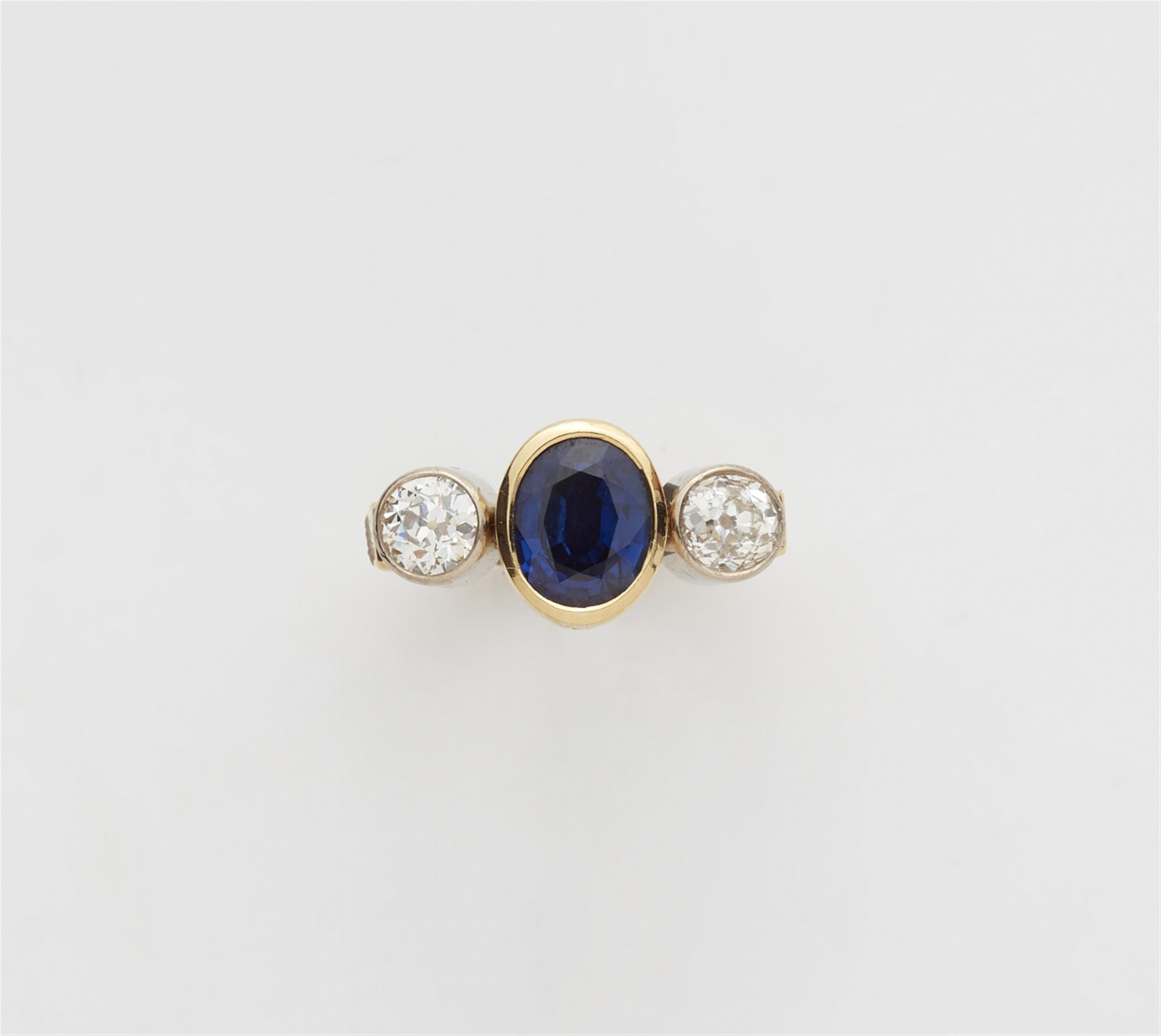 An 18k gold sapphire trinity ring - image-1
