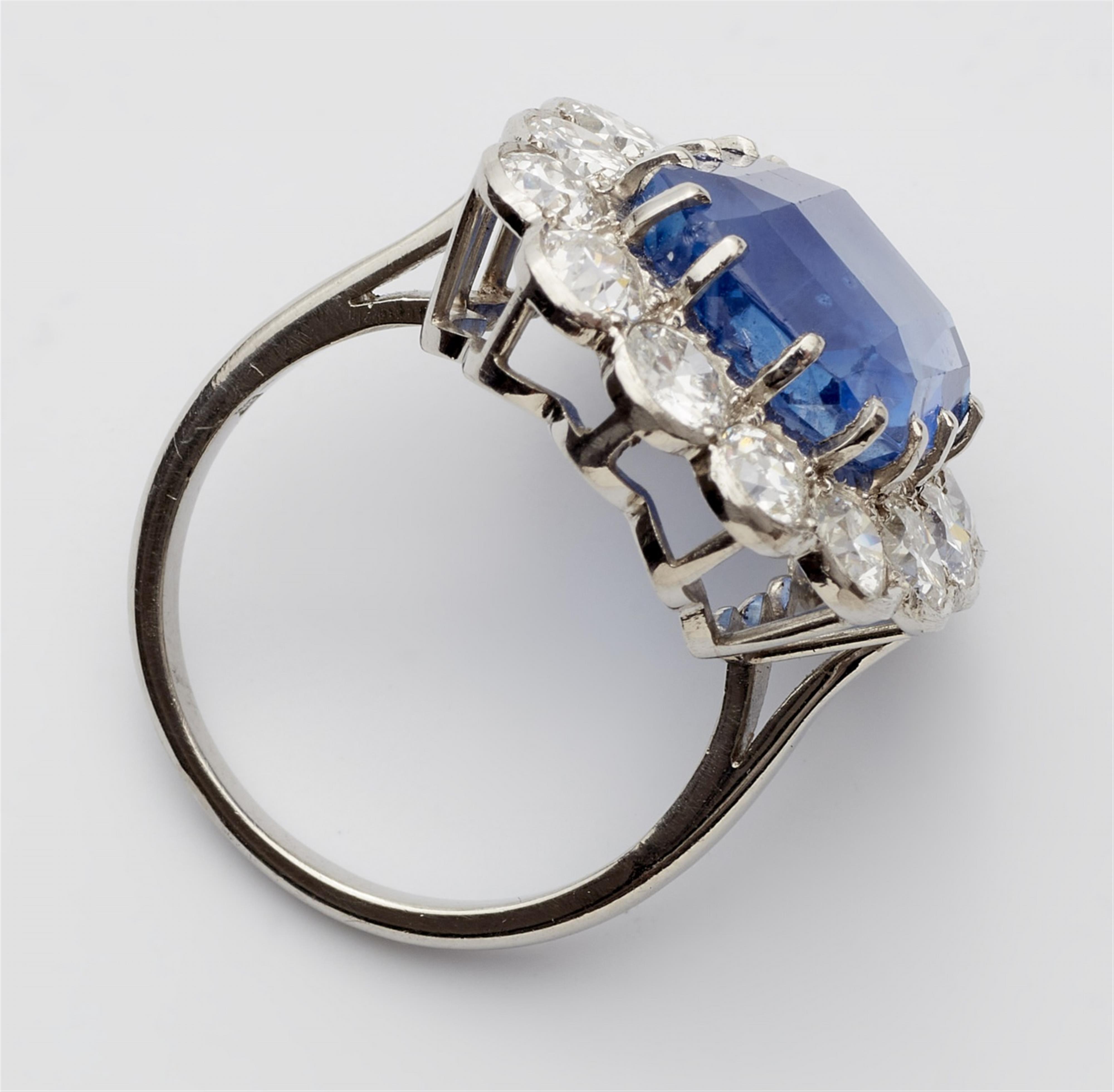 A platinum diamond and natural Ceylon sapphire cluster ring - image-3
