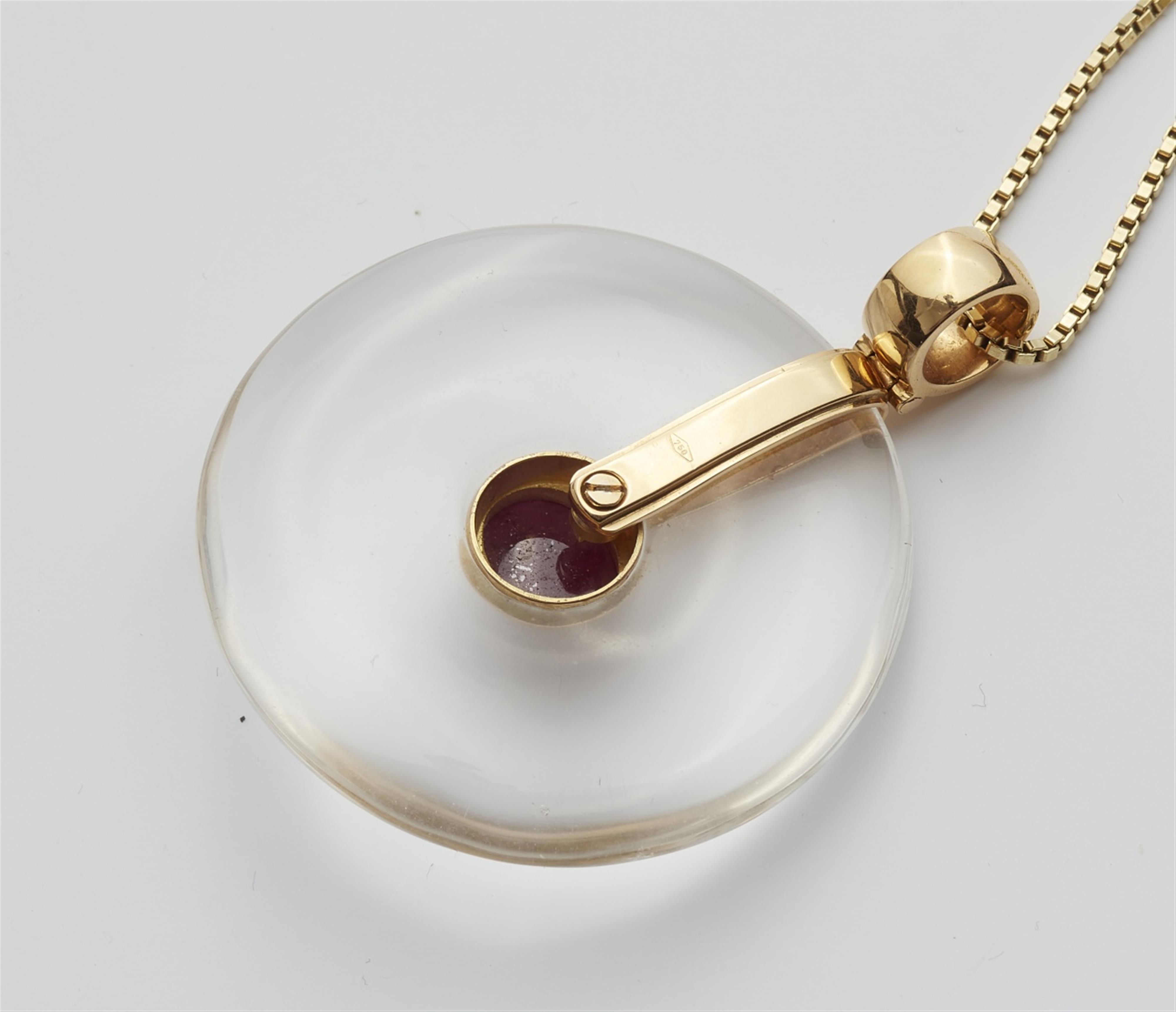 An 18k gold ruby and quartz pendant necklace - image-2