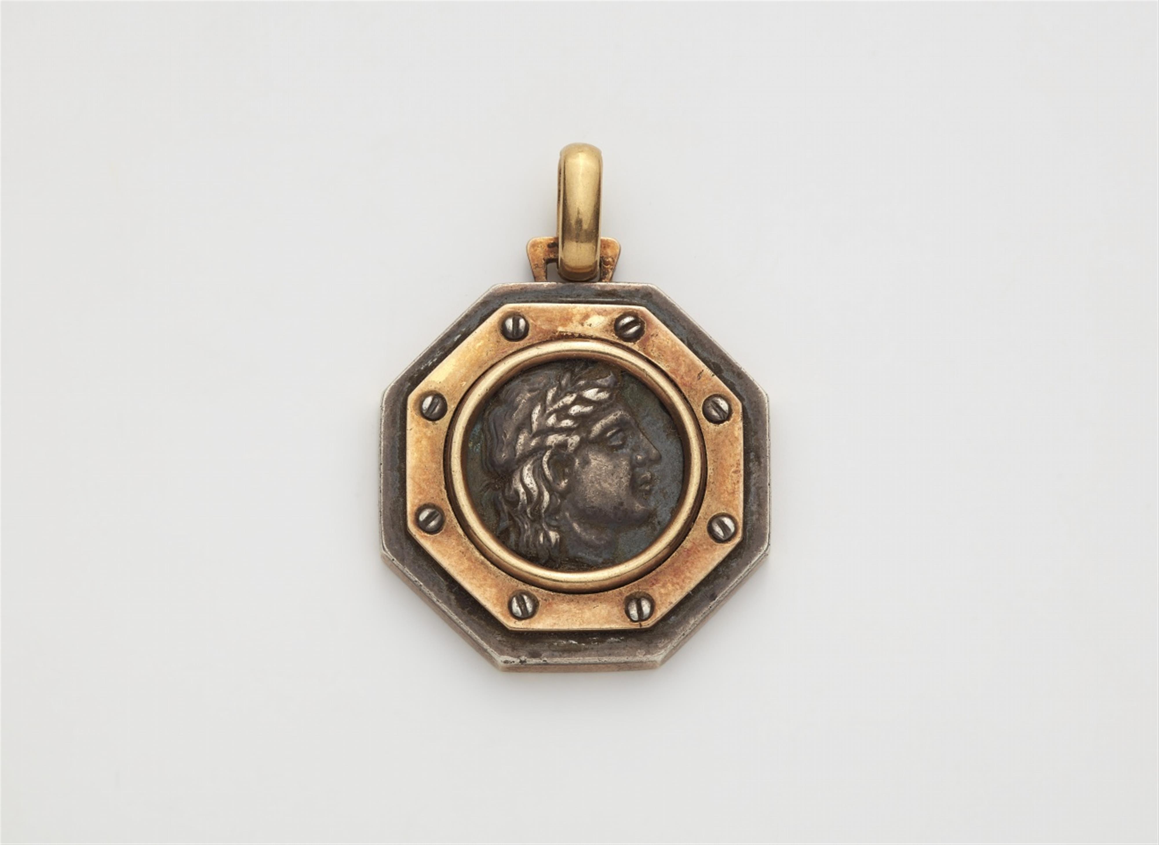 An 18k gold and silver pendant with a Hellenistic silver coin - image-1