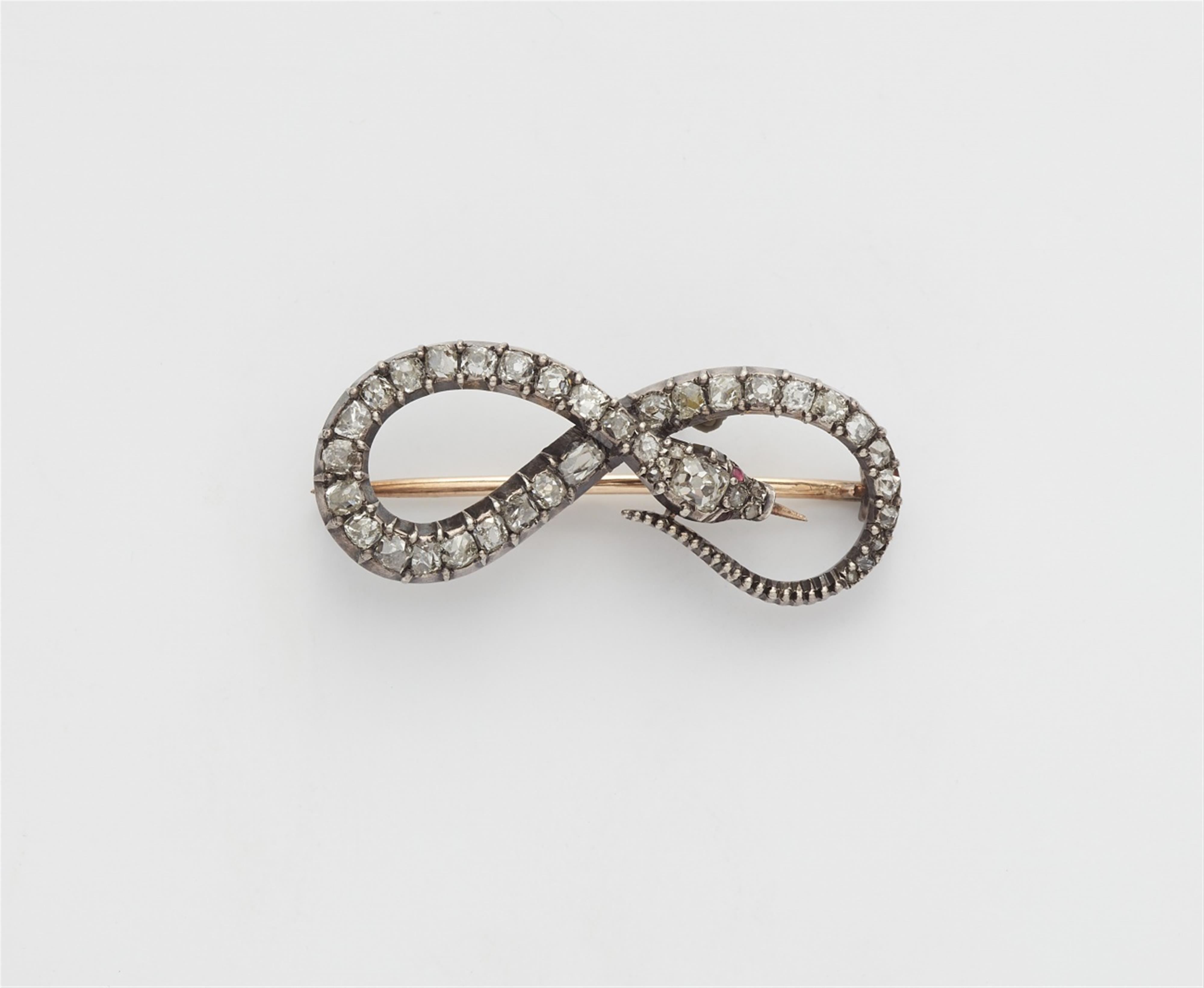 A silver and 14k gold diamond snake brooch - image-1