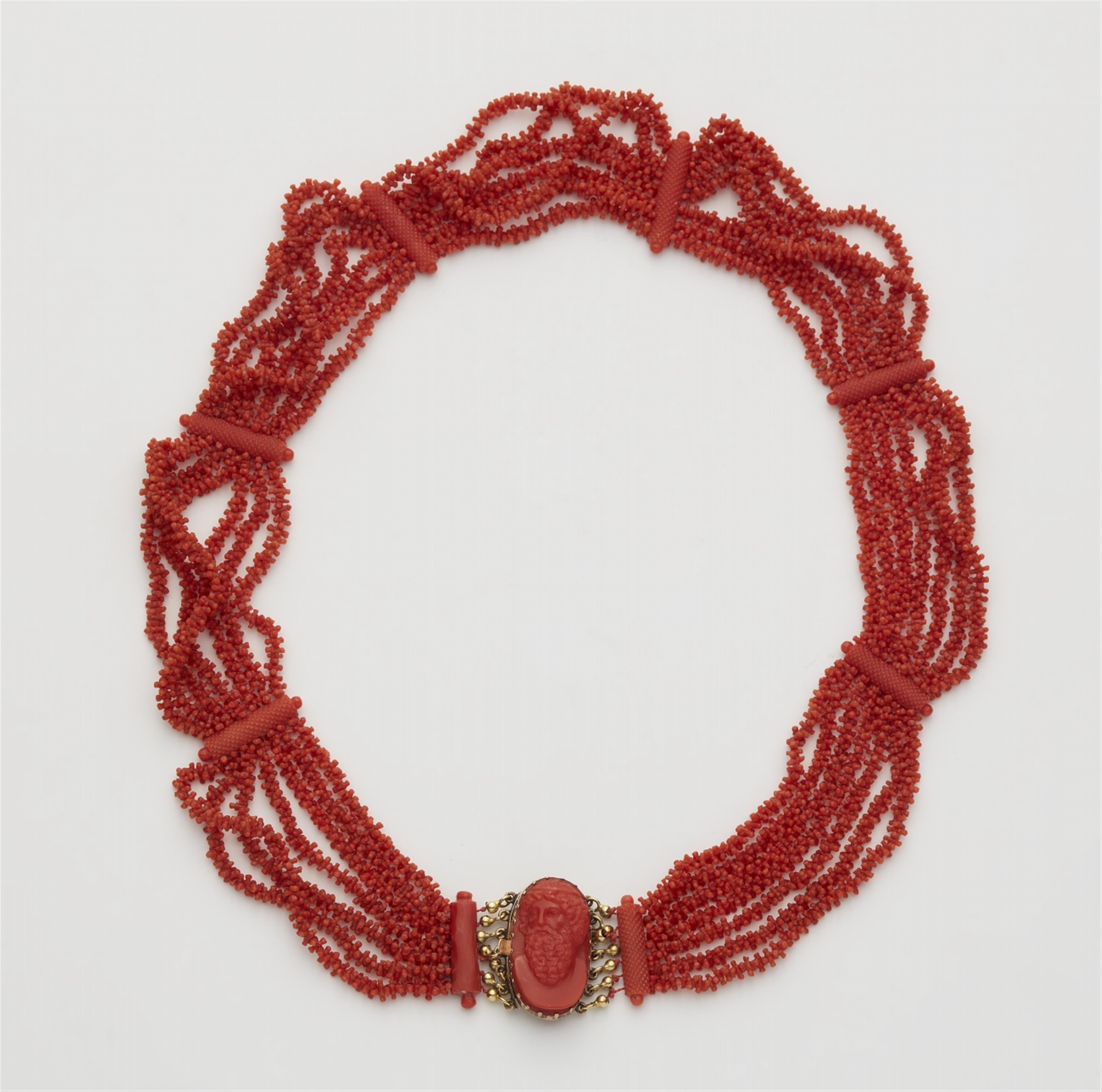 A 14k red gold coral necklace with a shell cameo clasp - image-1
