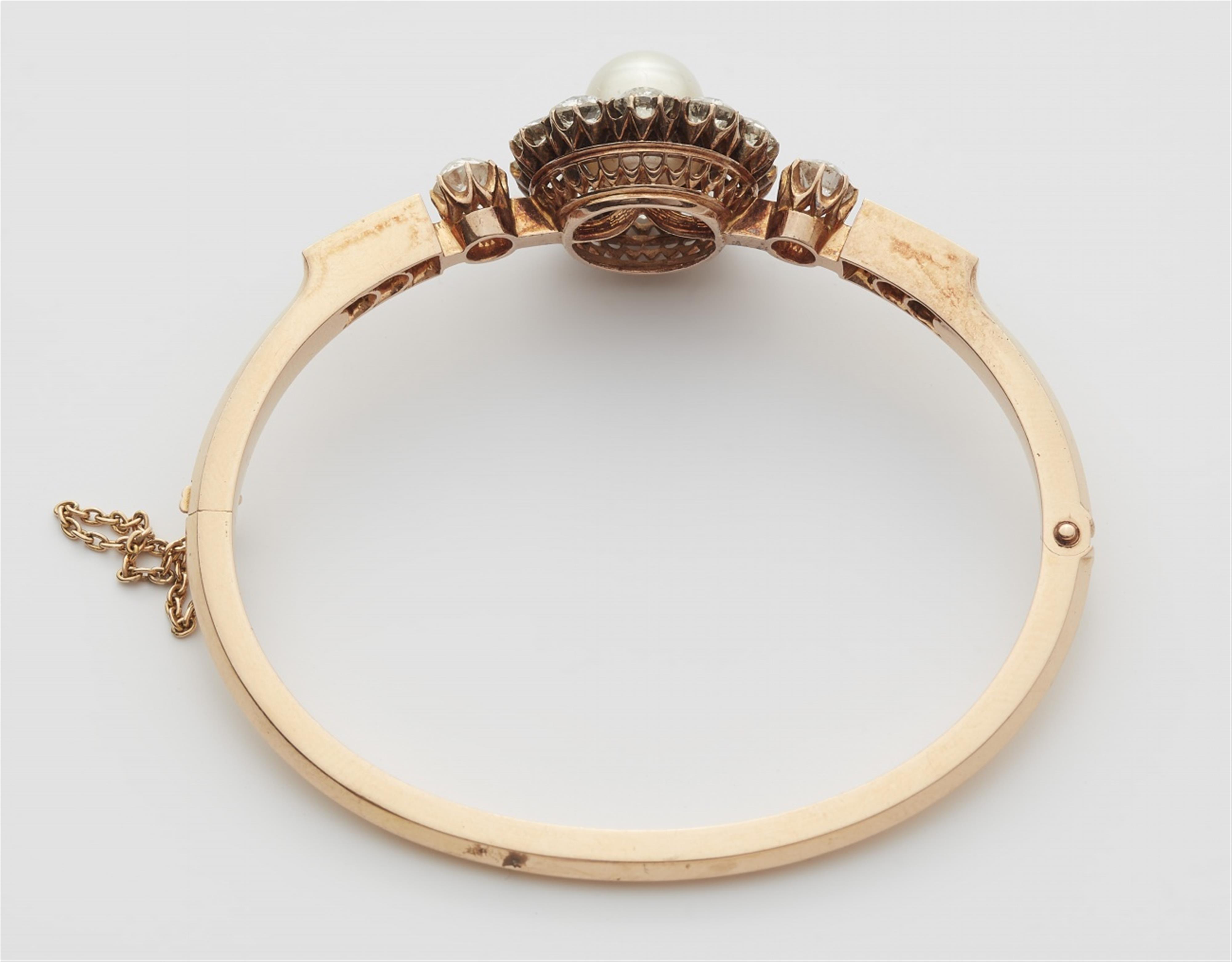 A Belle Epoque 18k red gold pearl and diamond bangle - image-2