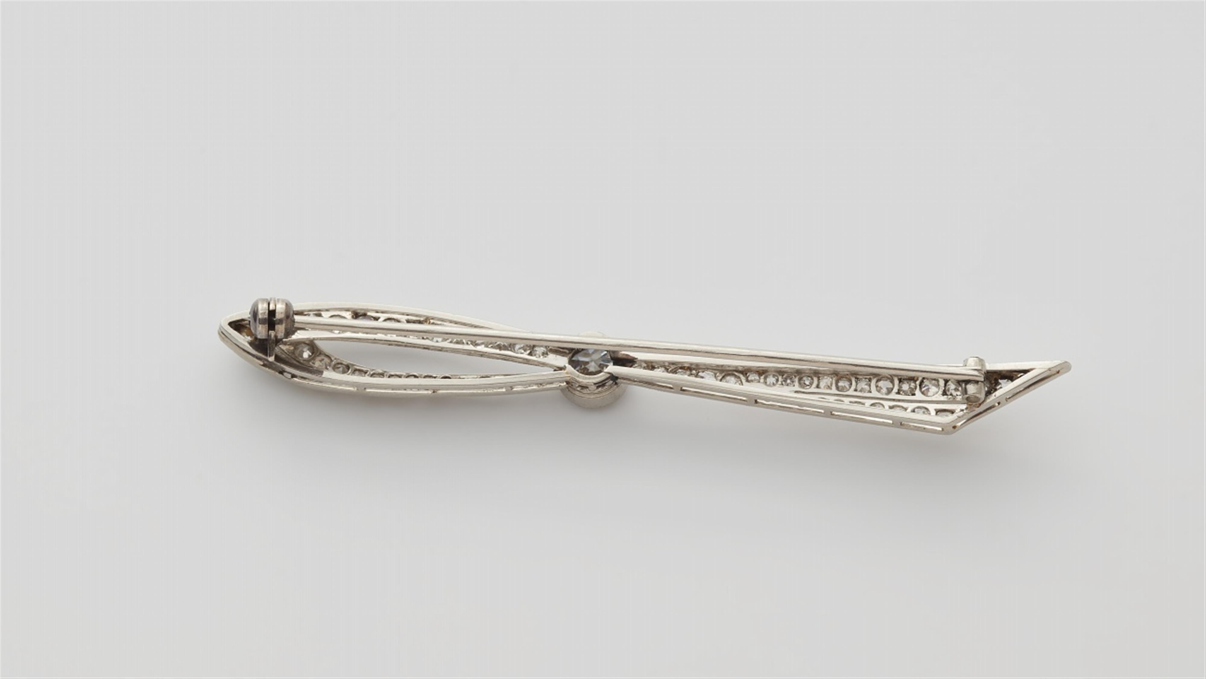 A Belle Epoque platinum and 14k white gold diamond pin brooch - image-2