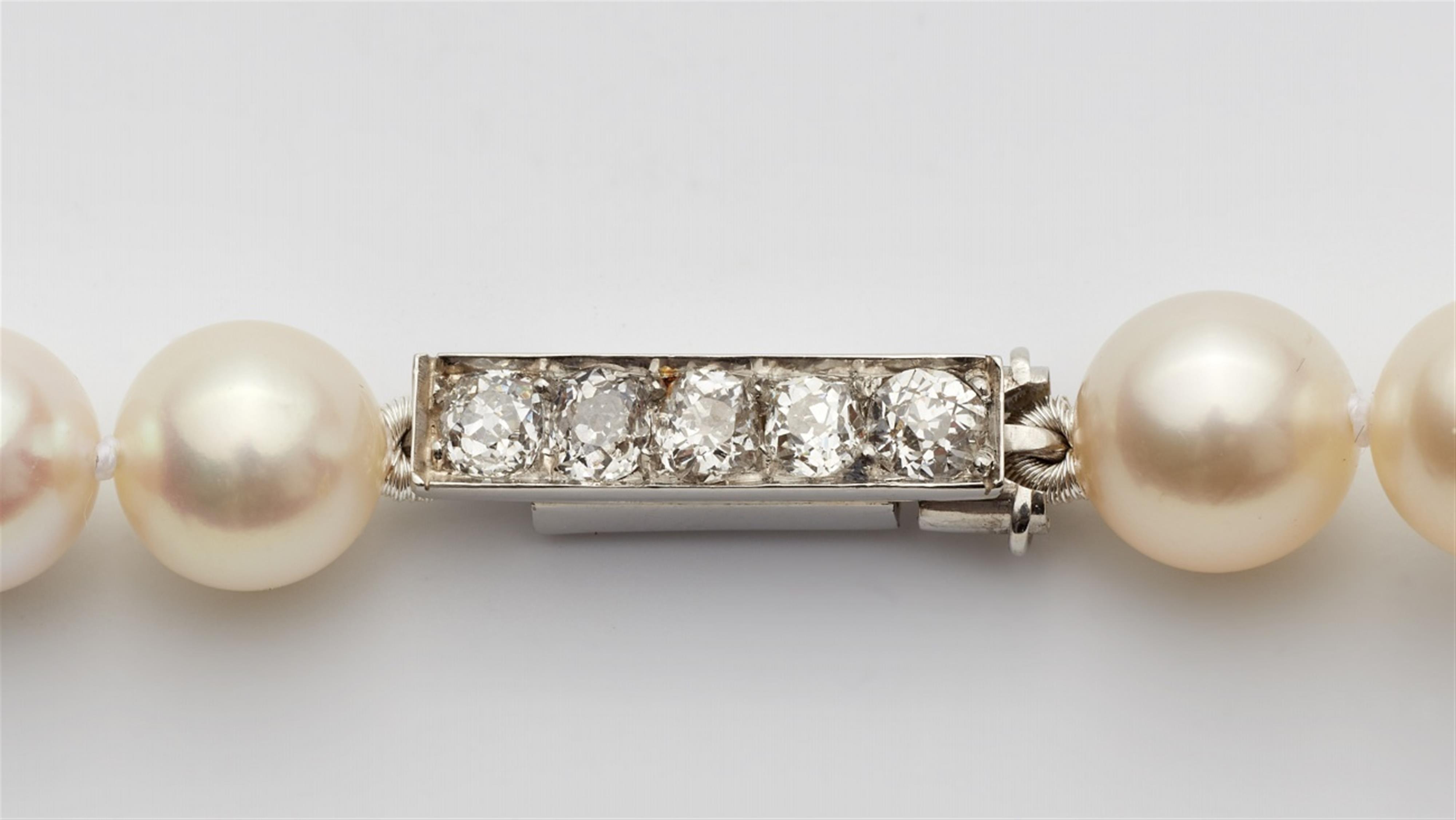A pearl sautoire with a 14k white gold diamond clasp - image-2