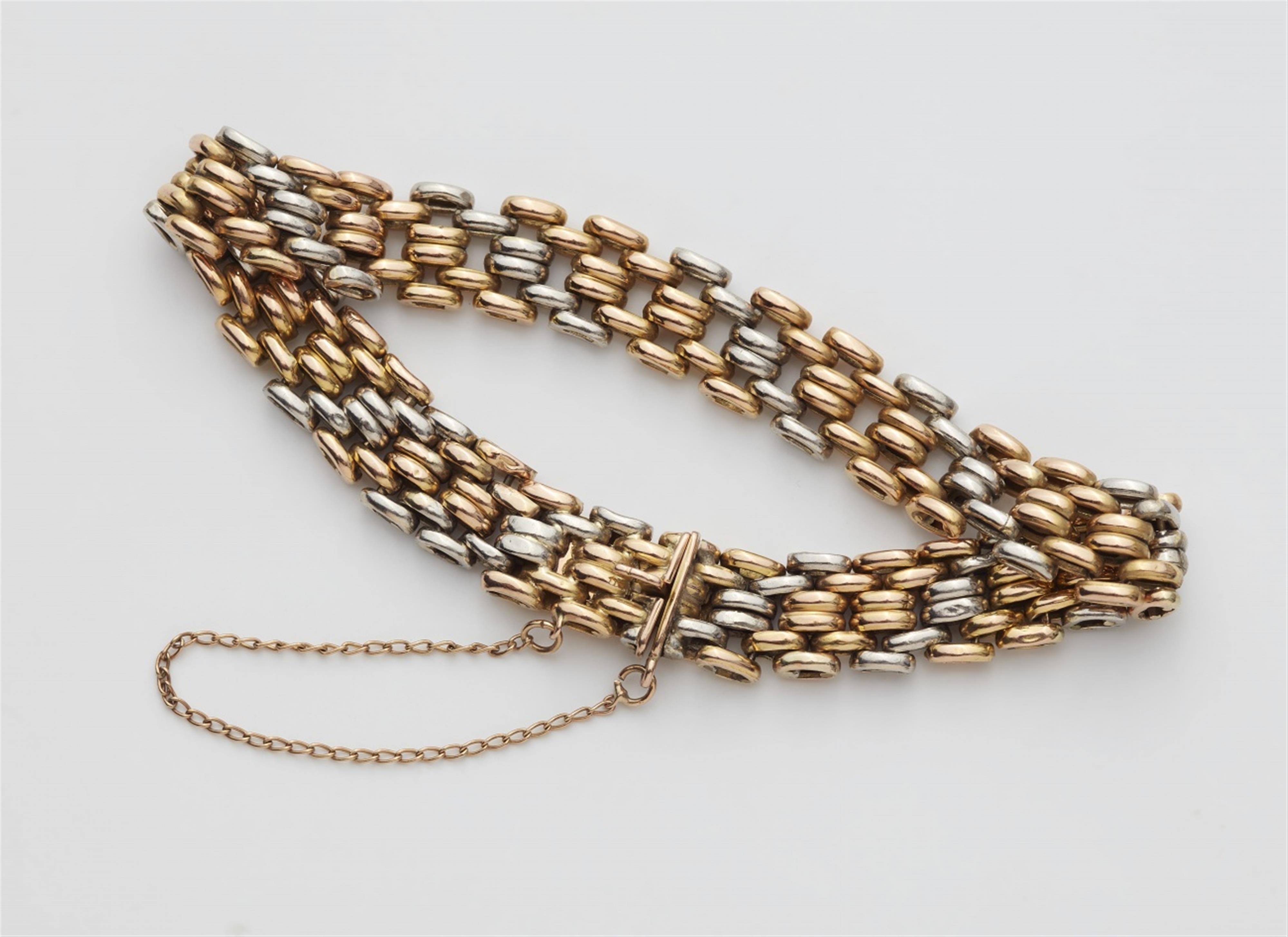 A bi-colour 14k gold chain bracelet - image-1