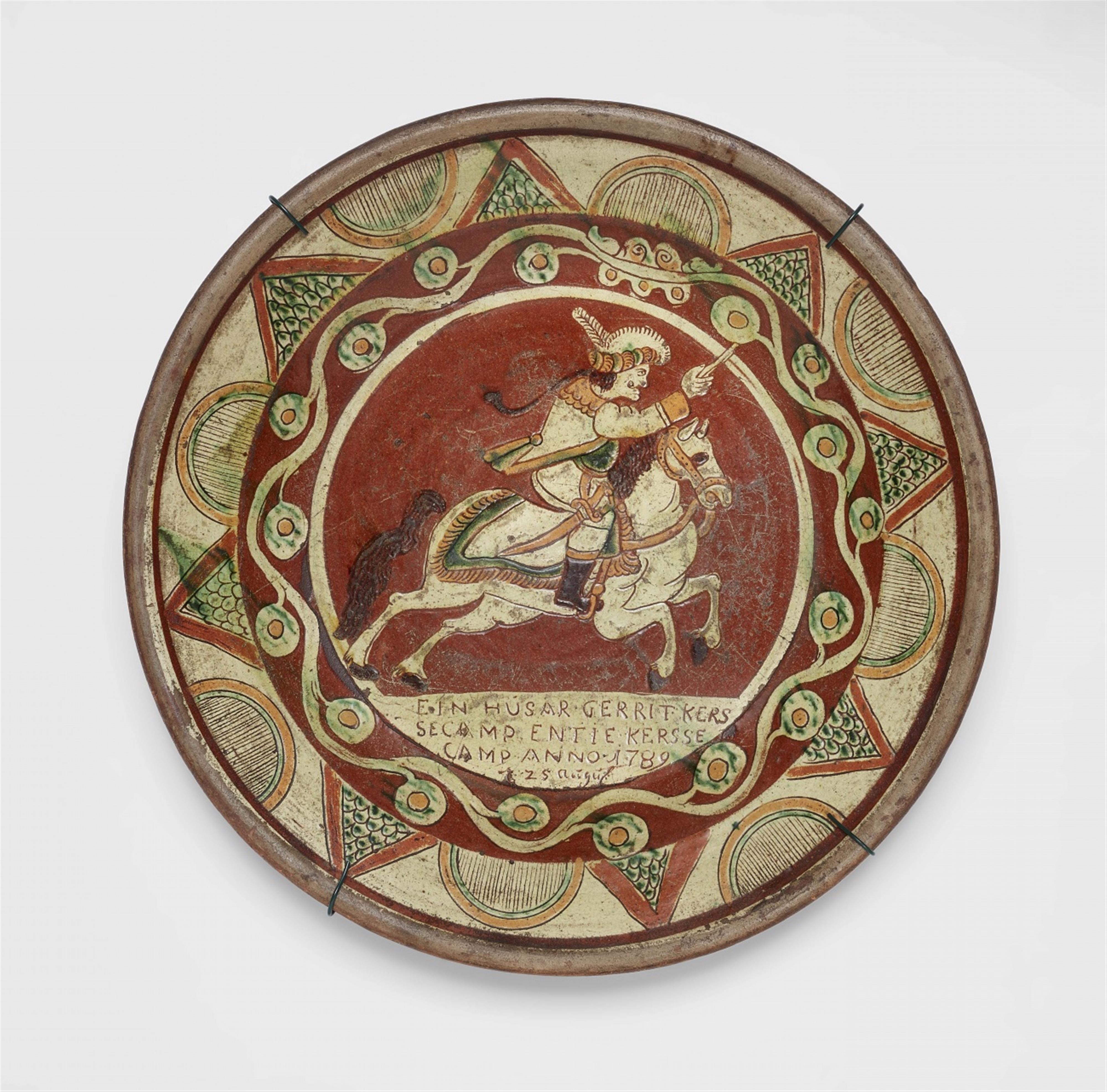 A Lower Rhenish earthenware dish with a hussar - image-1