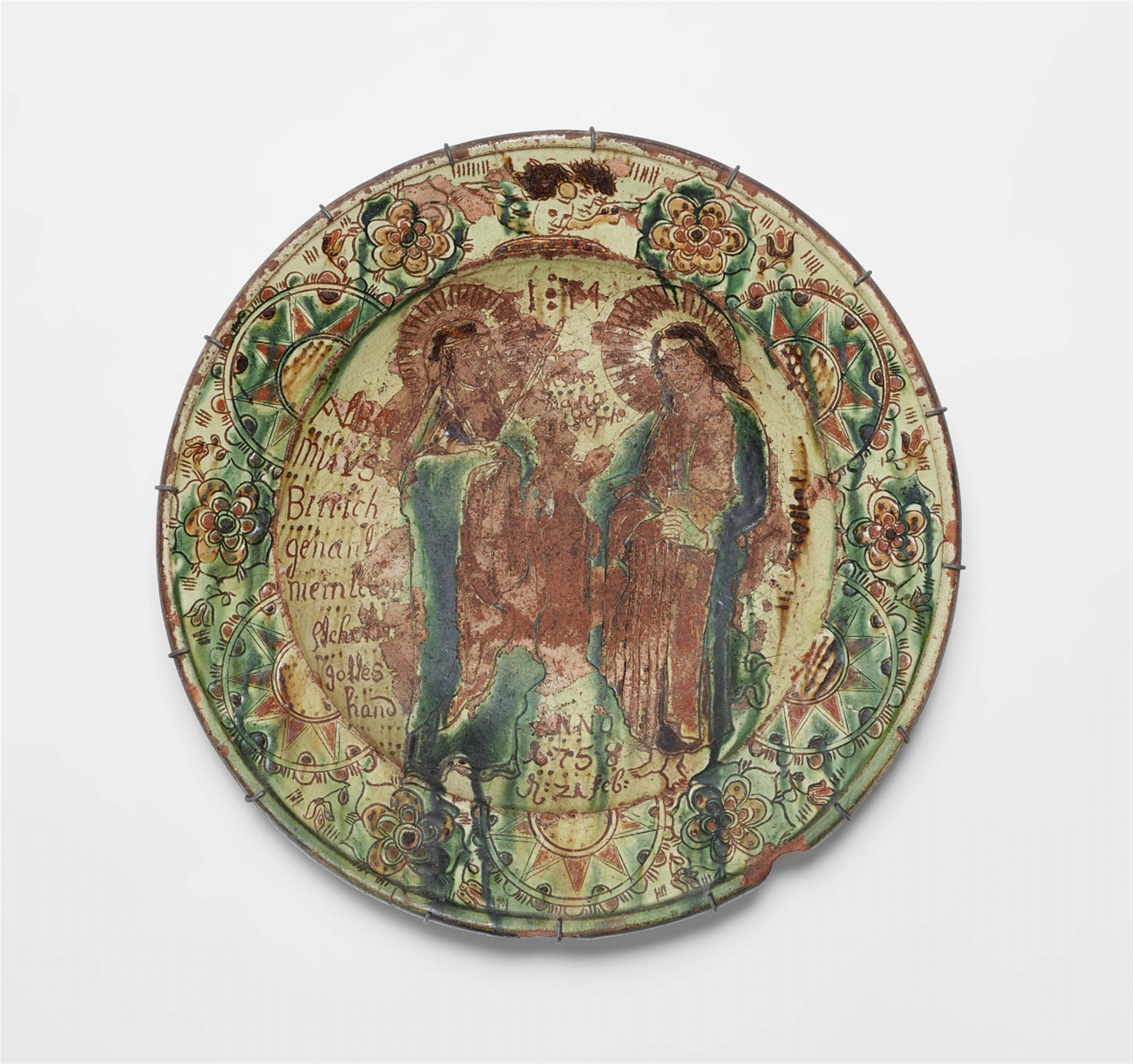 A Lower Rhenish earthenware dish with two saints - image-1