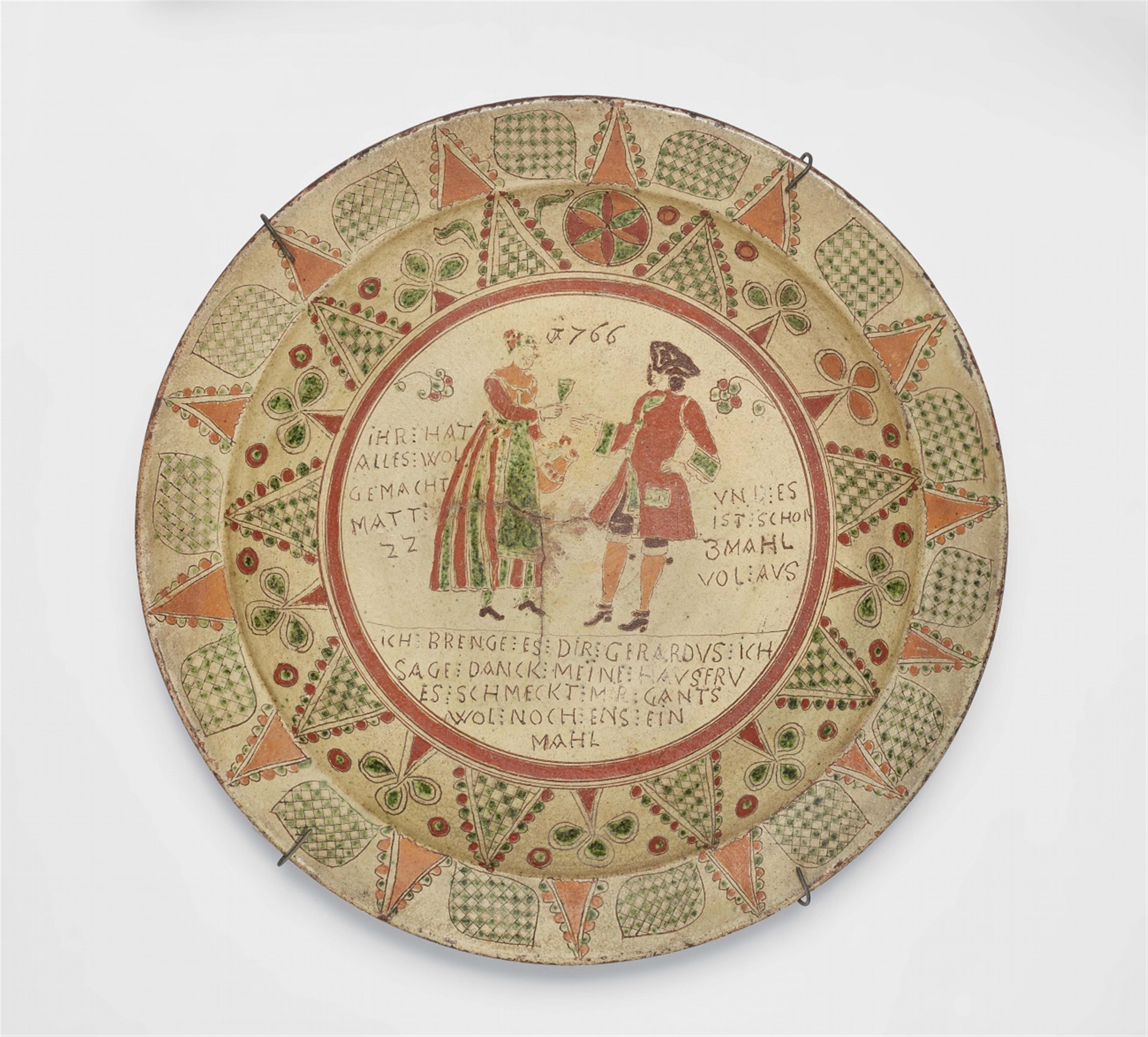 A Lower Rhenish earthenware dish with a couple drinking - image-1