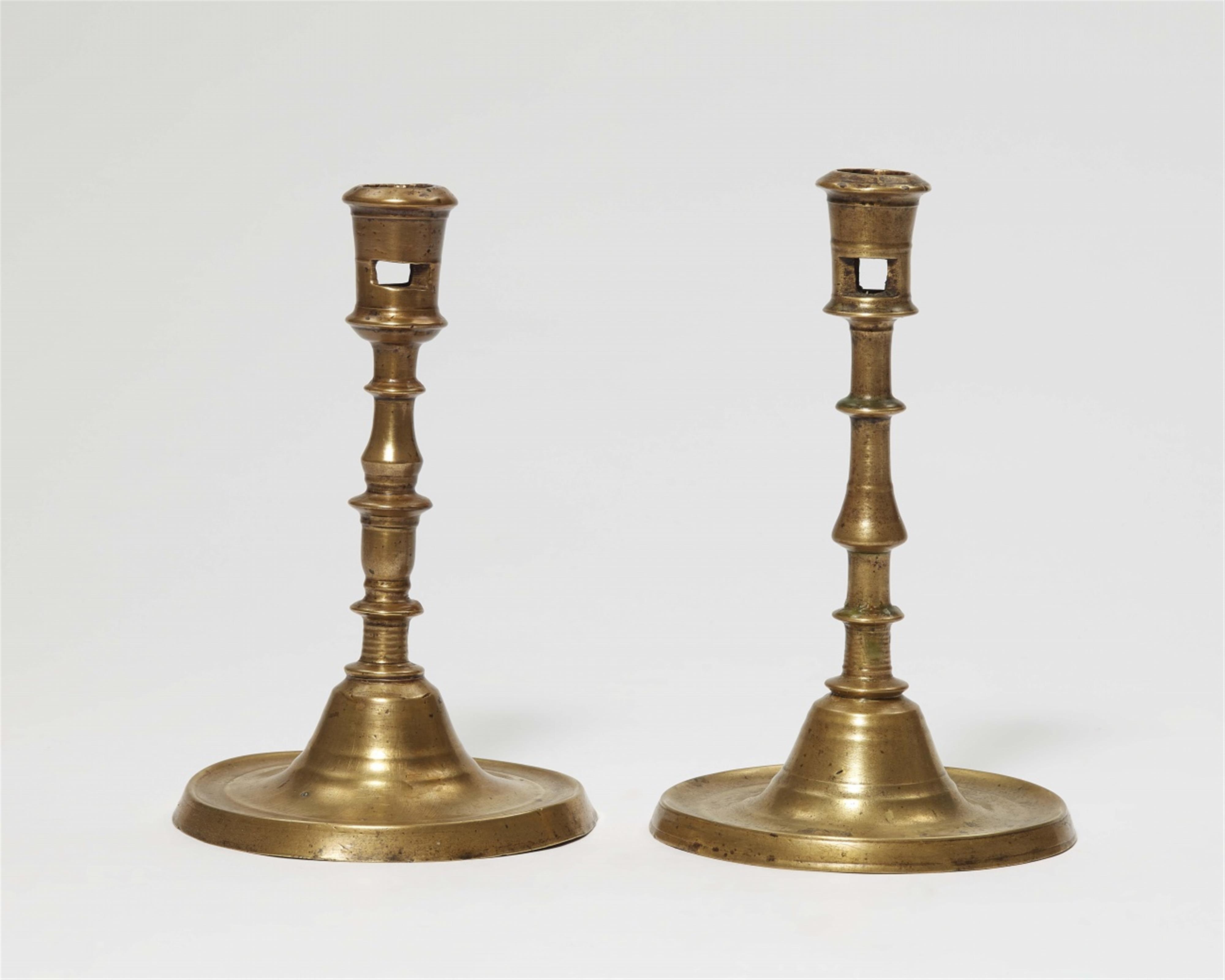 Two early Baroque brass candlesticks - image-1