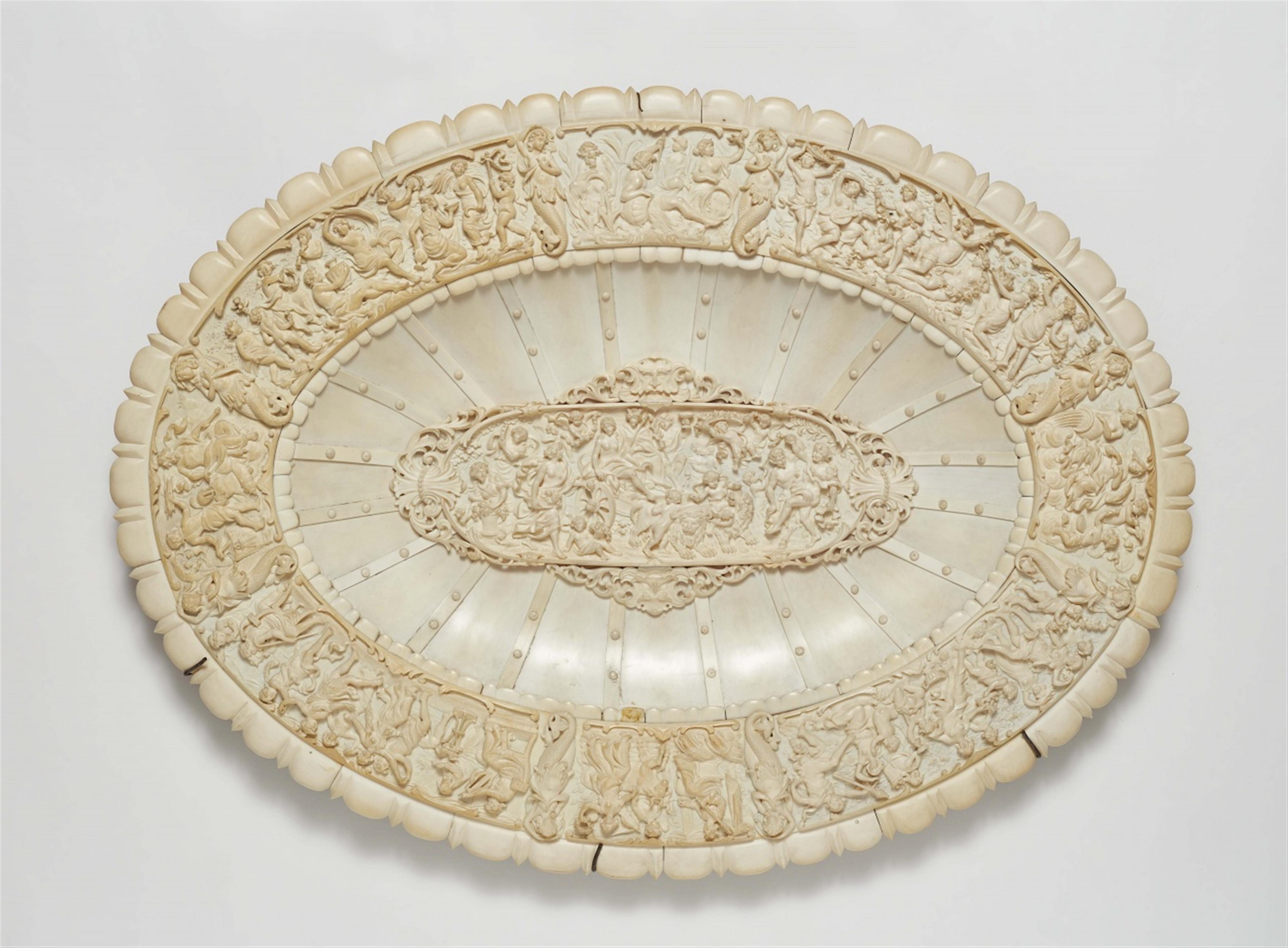 A large carved ivory platter with a bacchalian procession - image-1