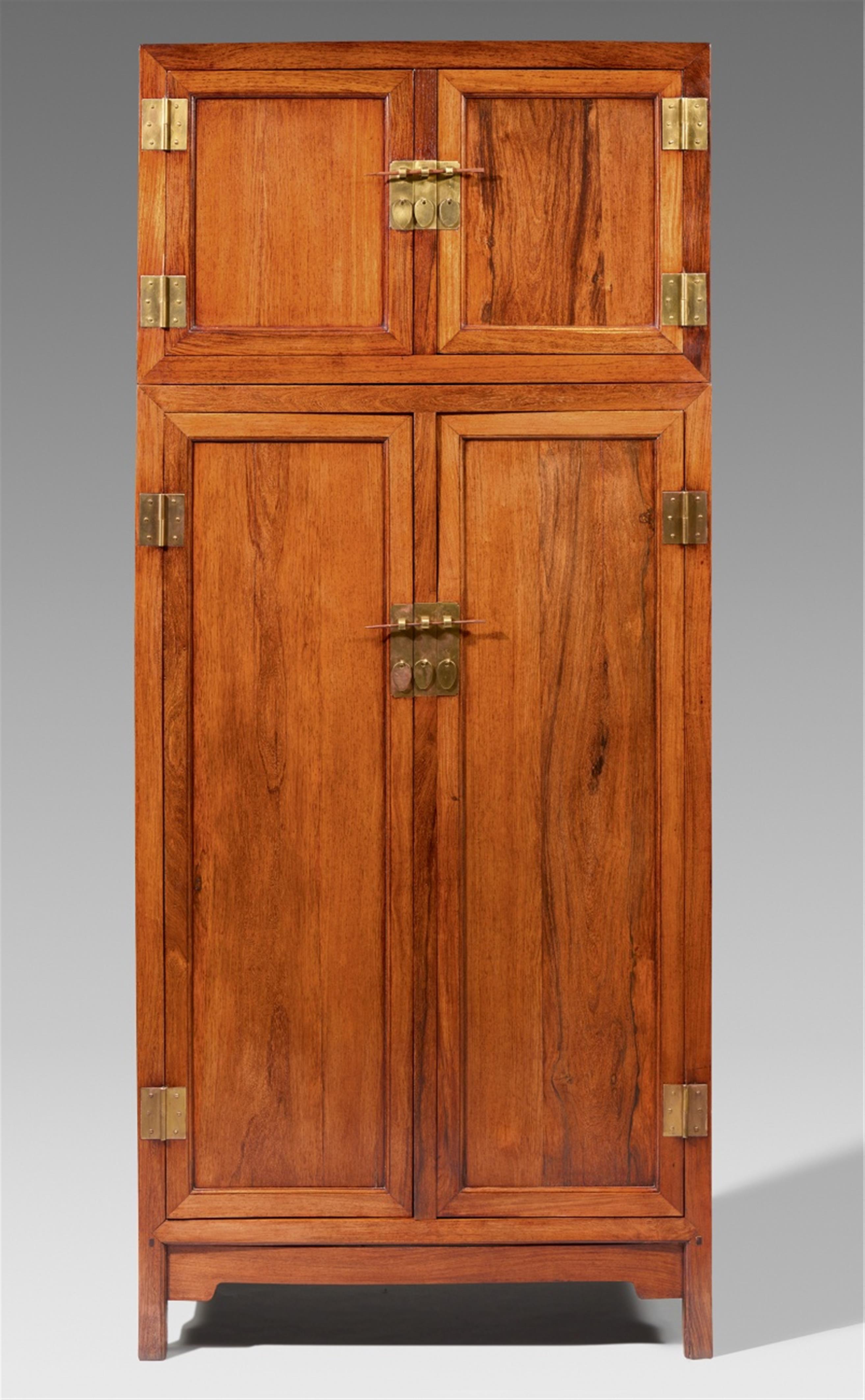 A pair of possibly huanghuali wood compound wardrobes with a top cupboard. 19th/20th century - image-1