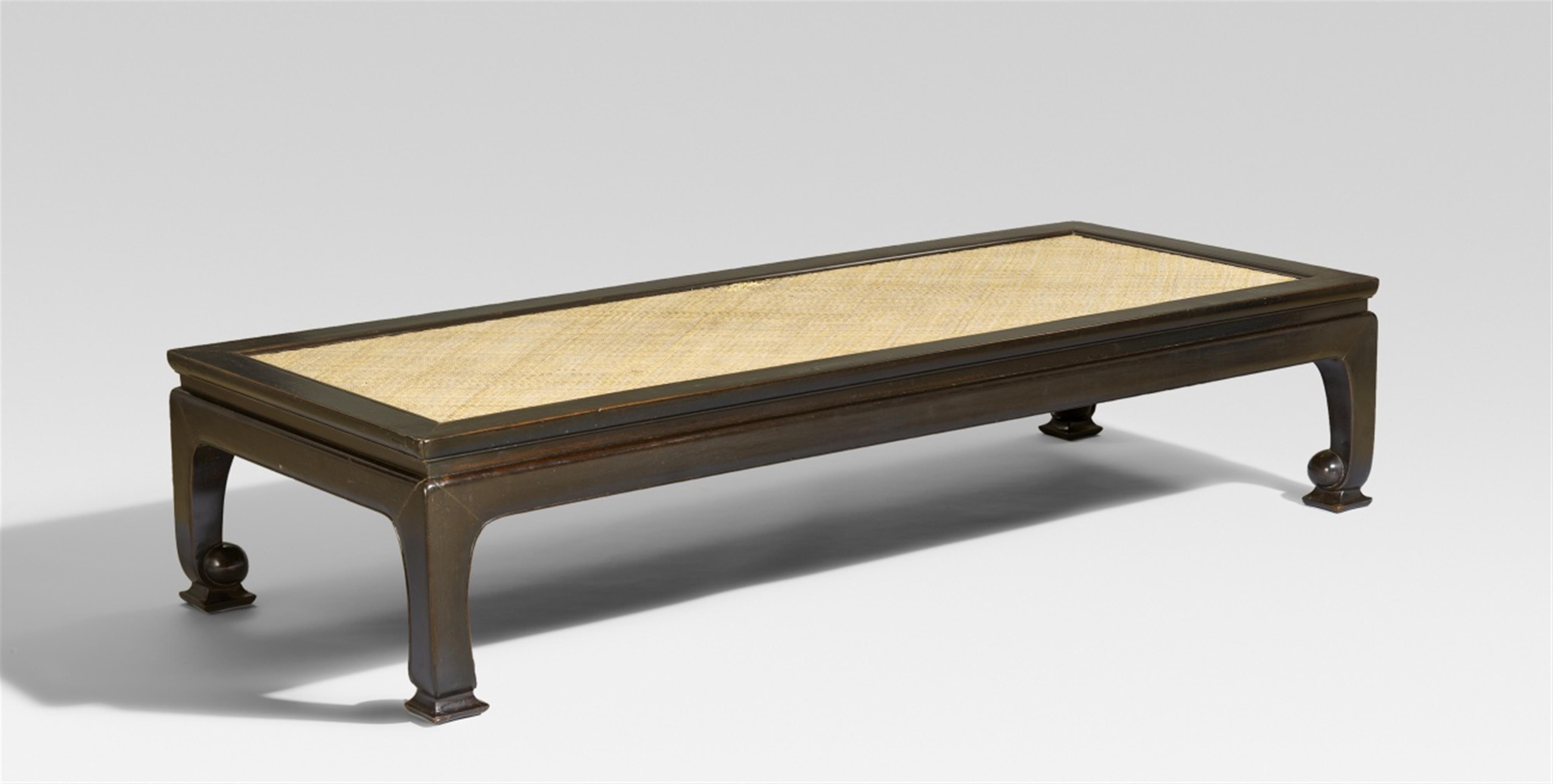 A waisted black hongmu daybed (ta). - image-1