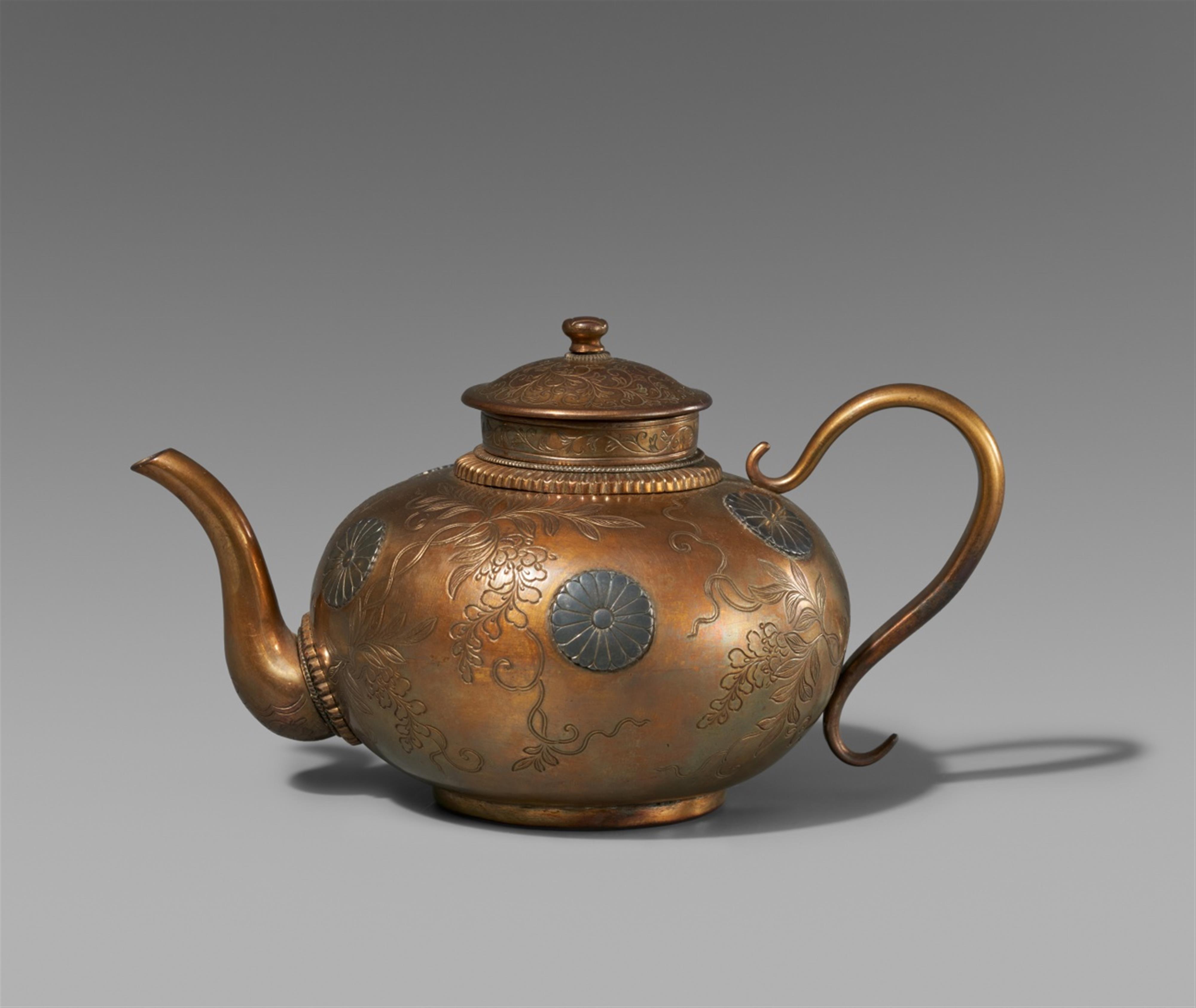 A small silver and metal tea pot. Late 19th century - image-1