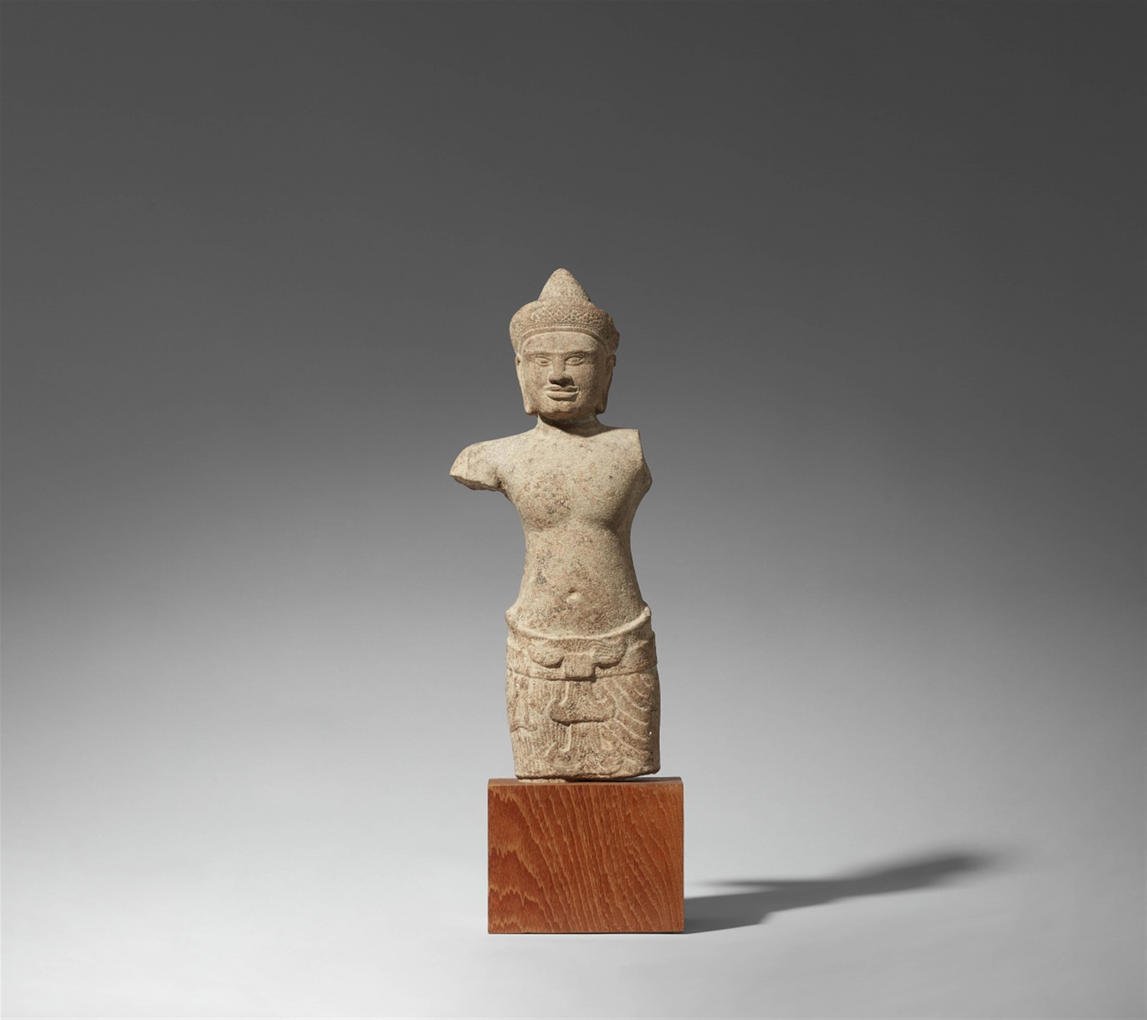 An Angkor fragmentary sandstone figure of a deity. Cambodia. 12th century - image-1