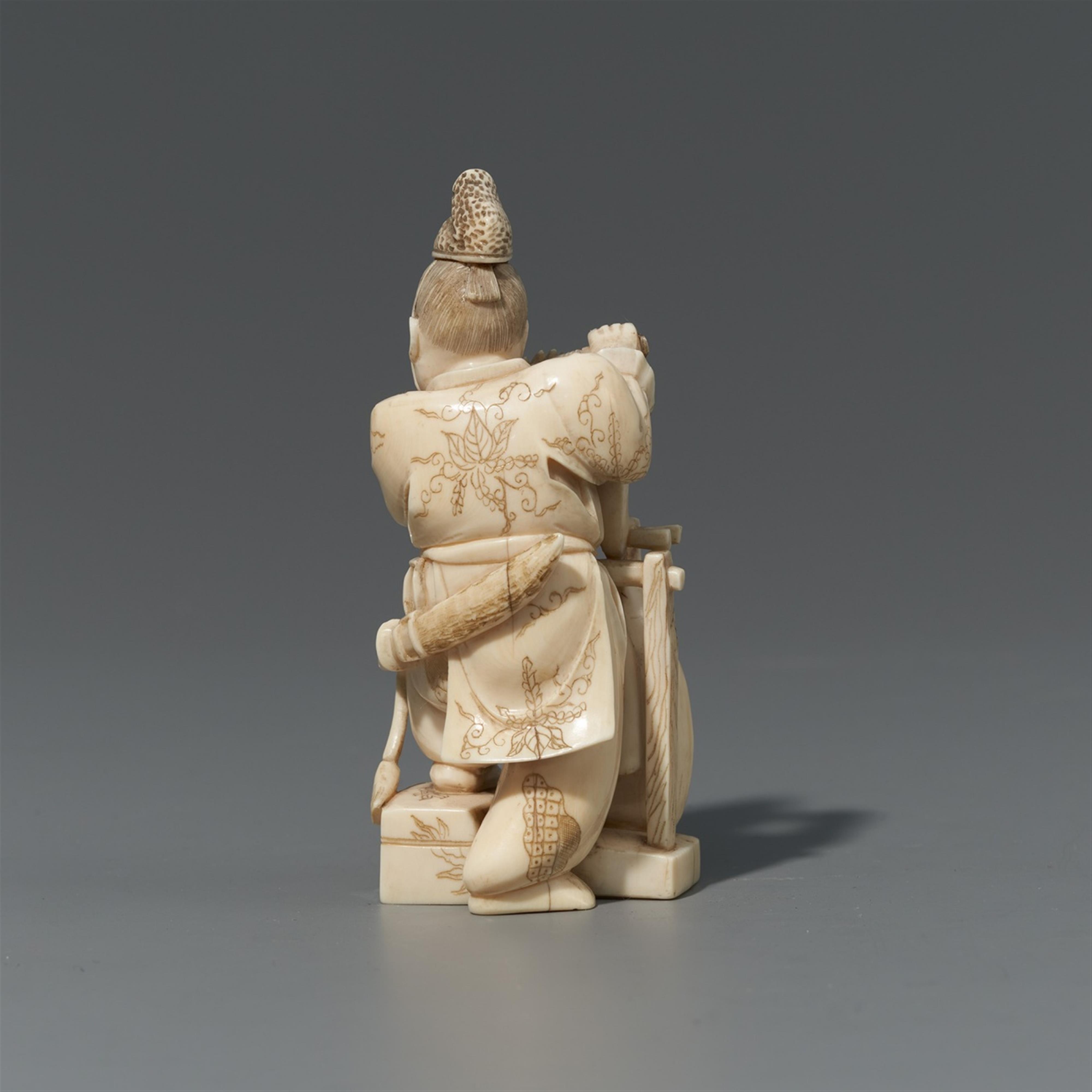 An ivory okimono of a courtier playing the flute. Late 19th century - image-2