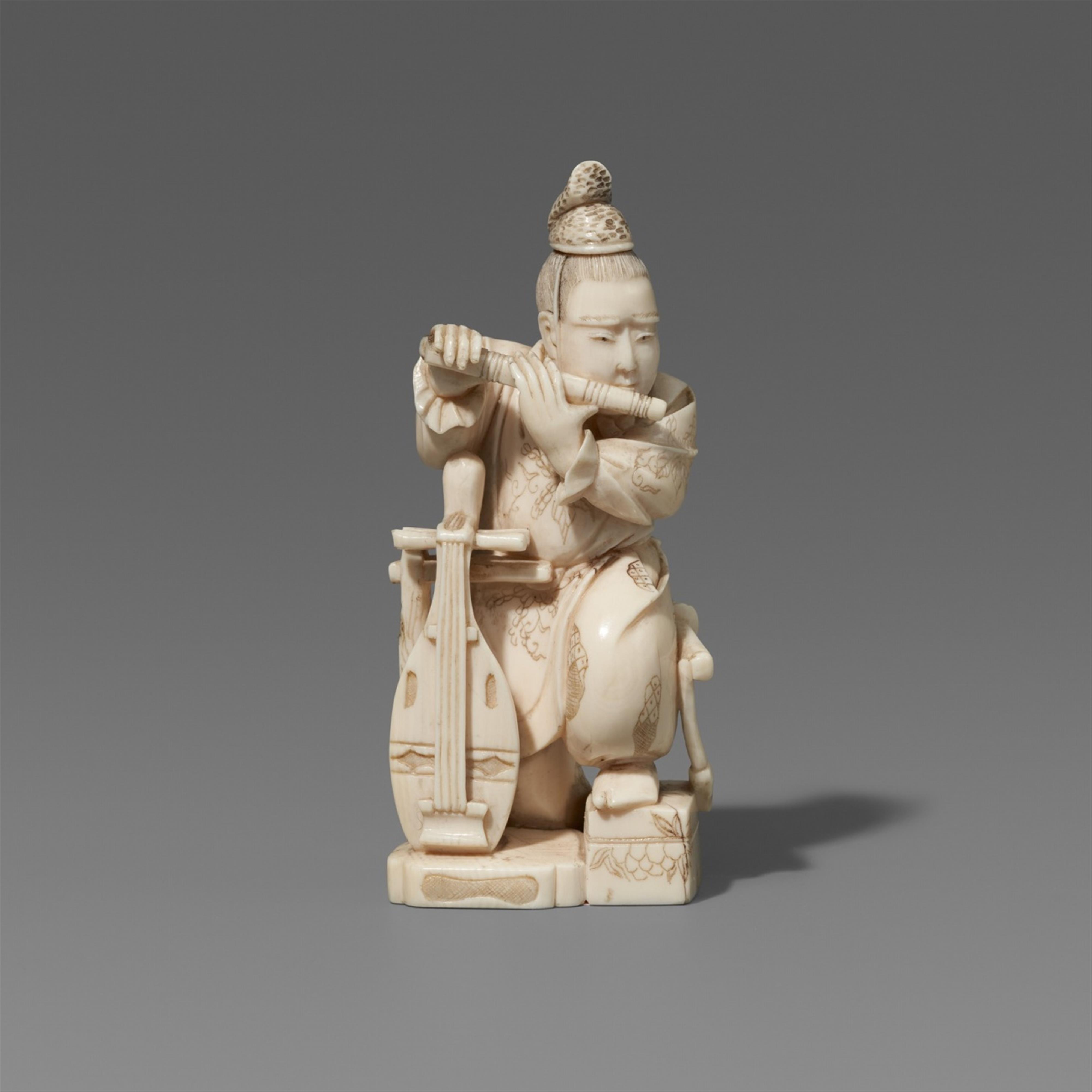 An ivory okimono of a courtier playing the flute. Late 19th century - image-1