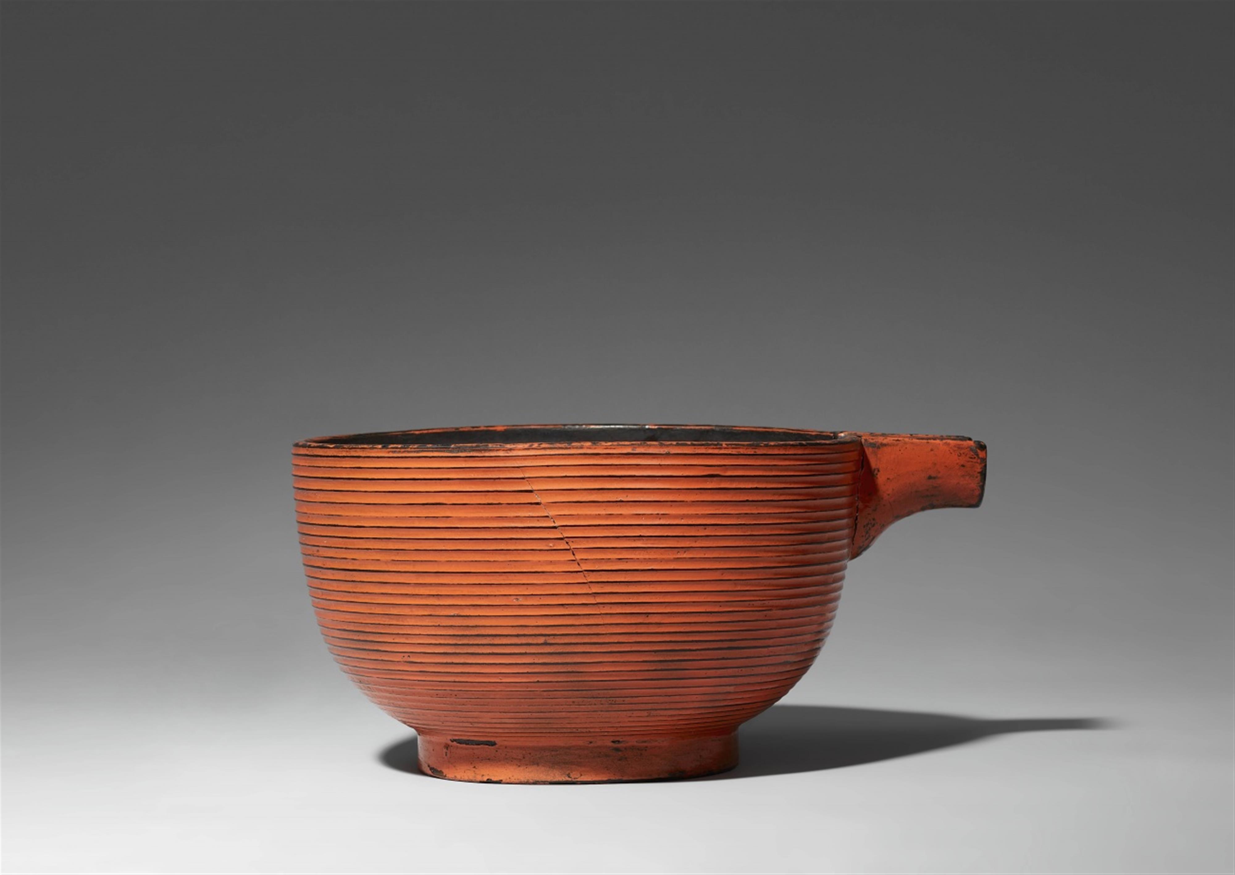 A large negoro-type bowl with a spout. Edo period - image-1