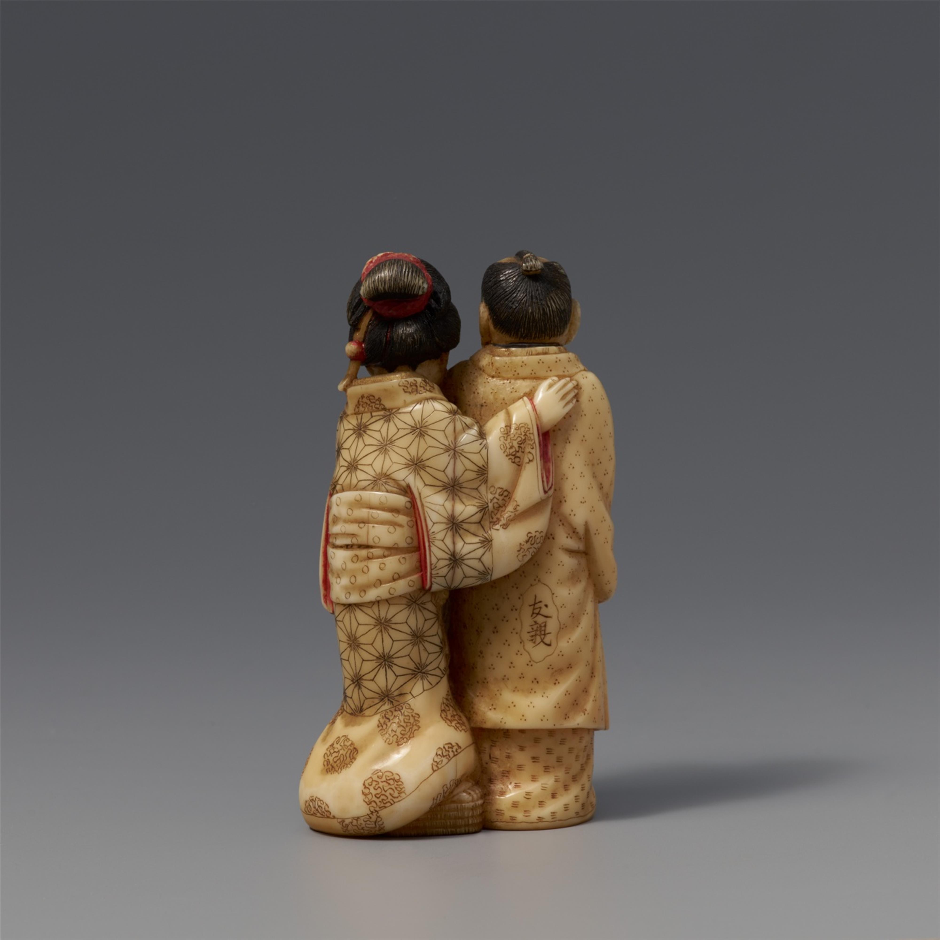 A small walrus ivory okimono of lovers. Second half 19th century - image-2