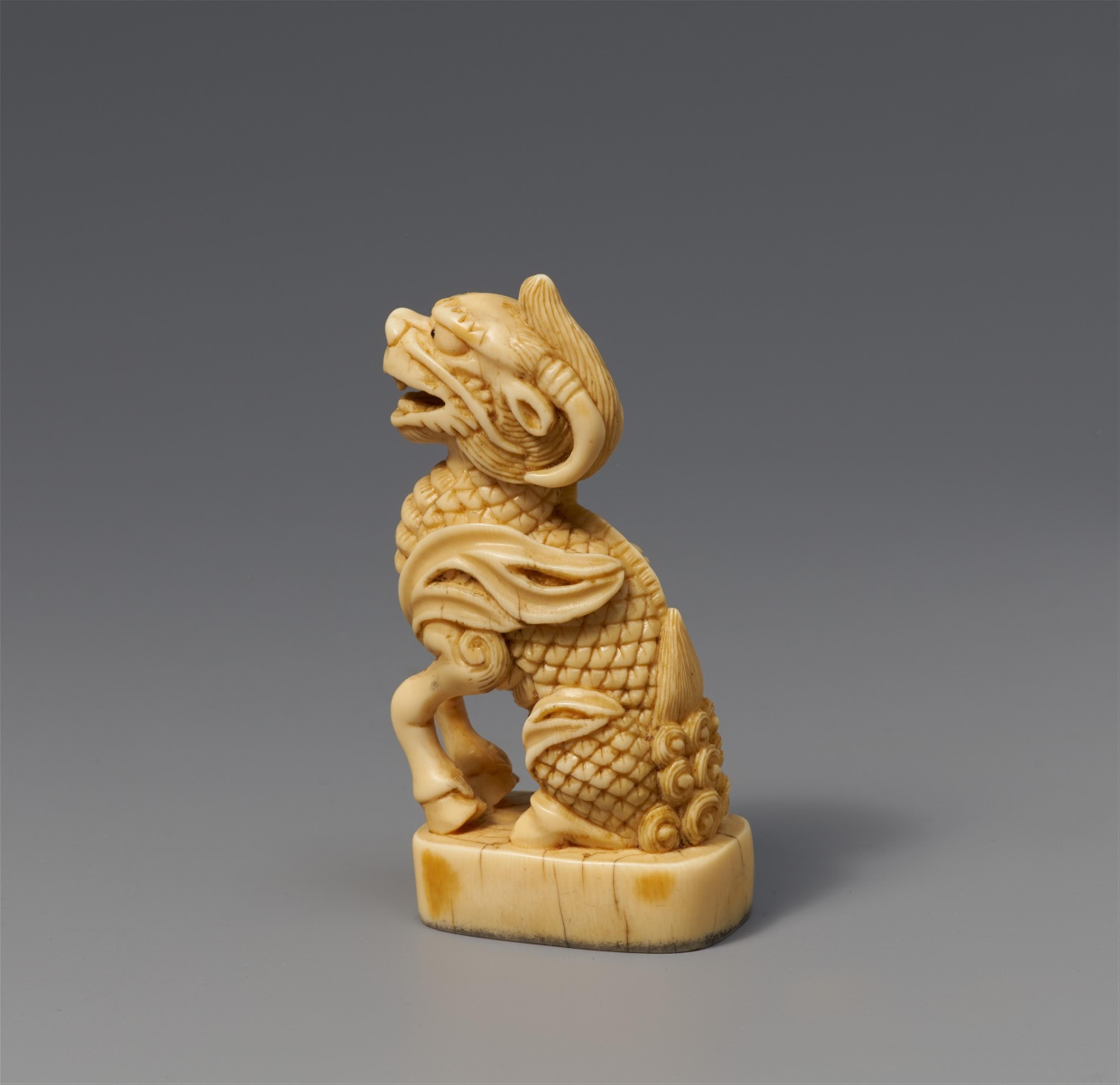 A large ivory seal netsuke of a kirin. 19th century - image-2