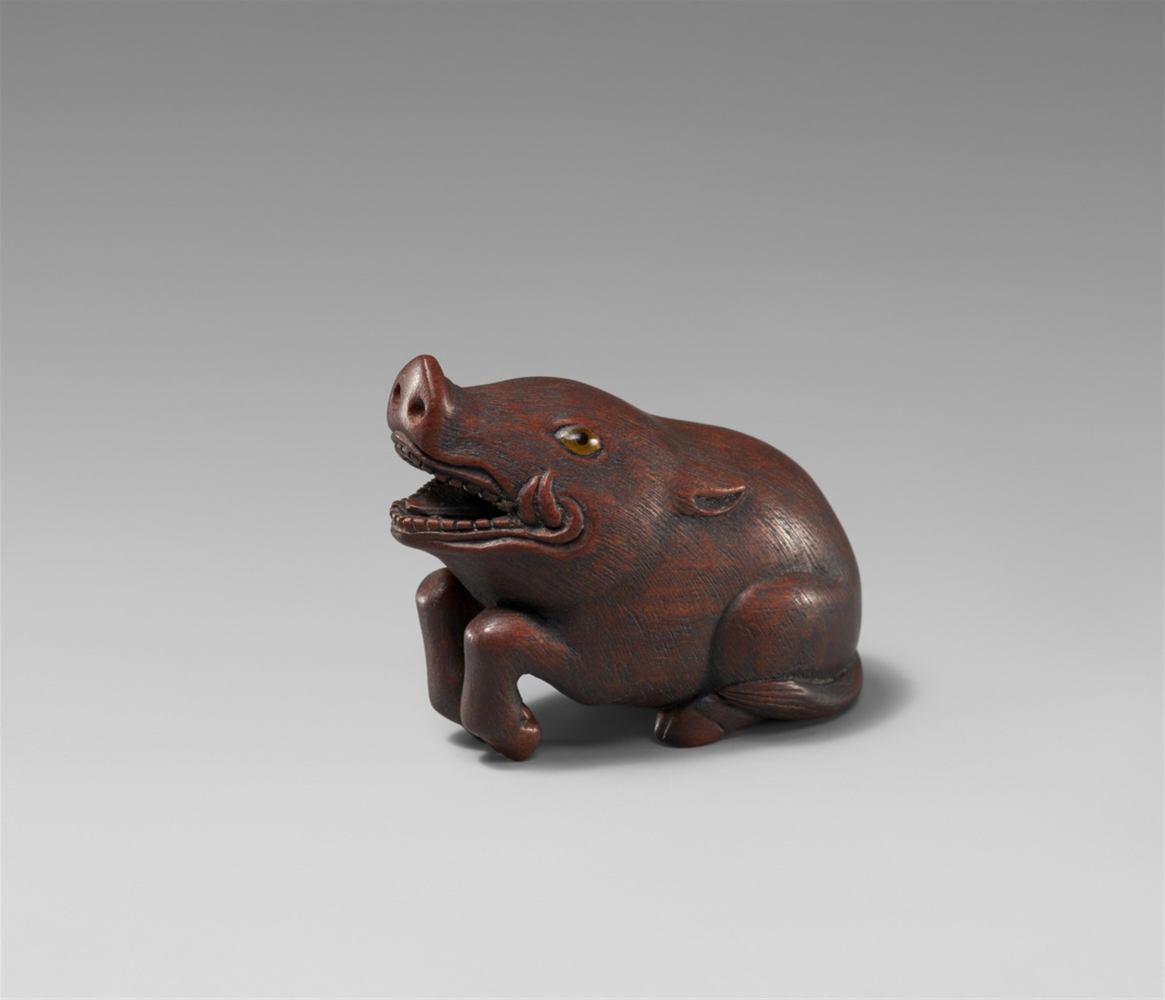 A wood netsuke of a boar. 20th century - image-1