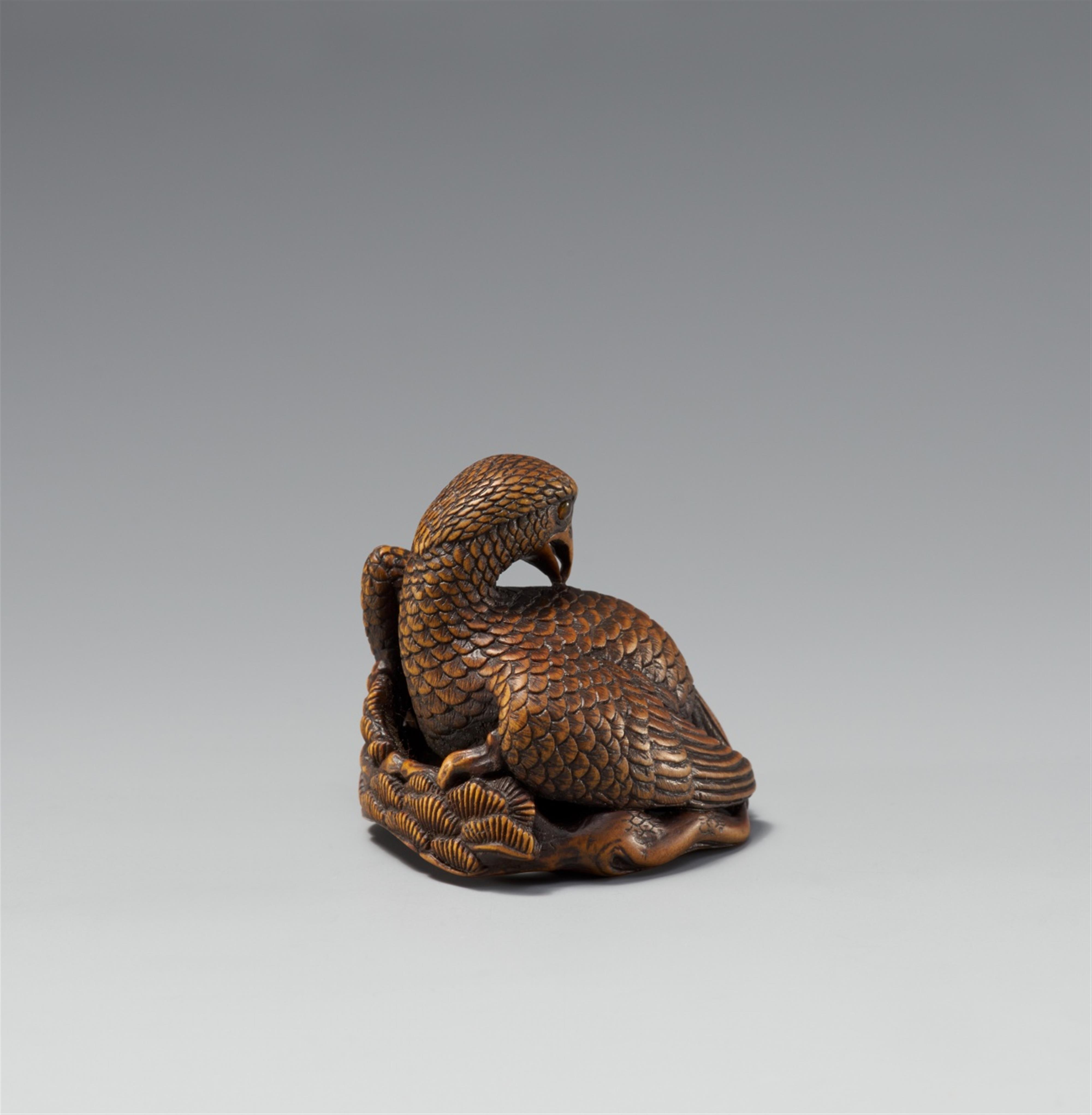 A boxwood netsuke of a large eagle - image-2