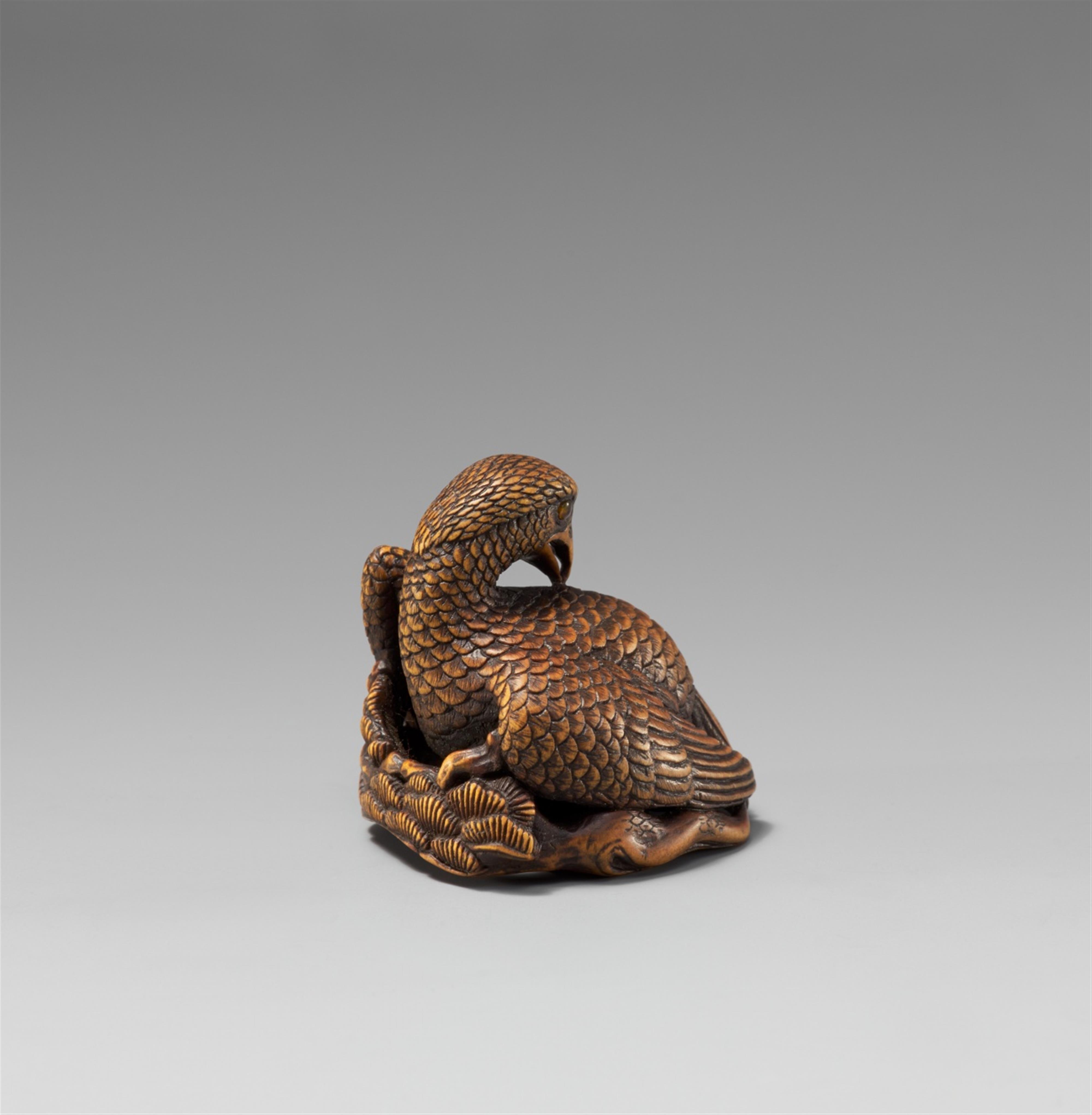 A boxwood netsuke of a large eagle - image-4