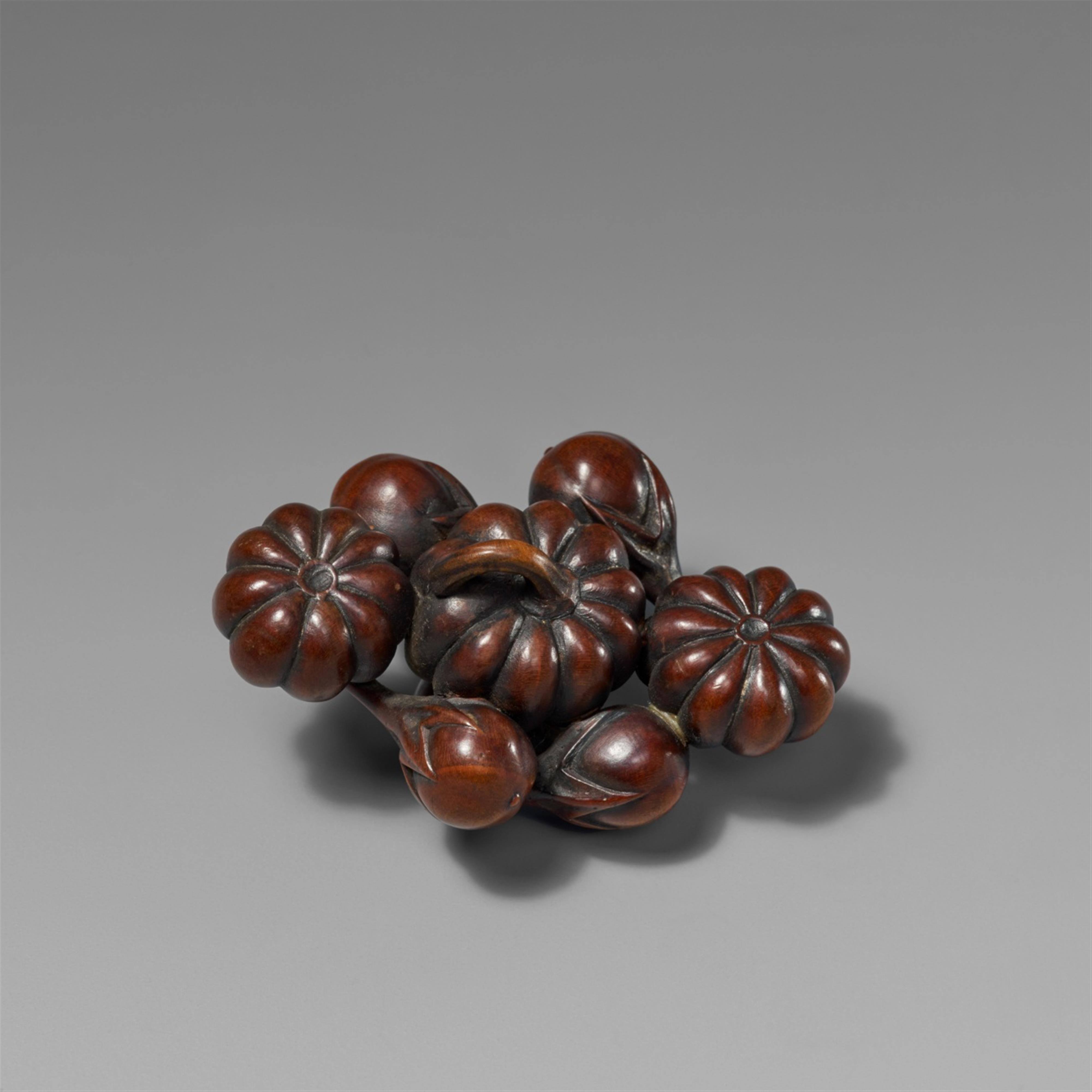 A boxwood netsuke of a group of the pumpkins and six nasubi. 19th century - image-1