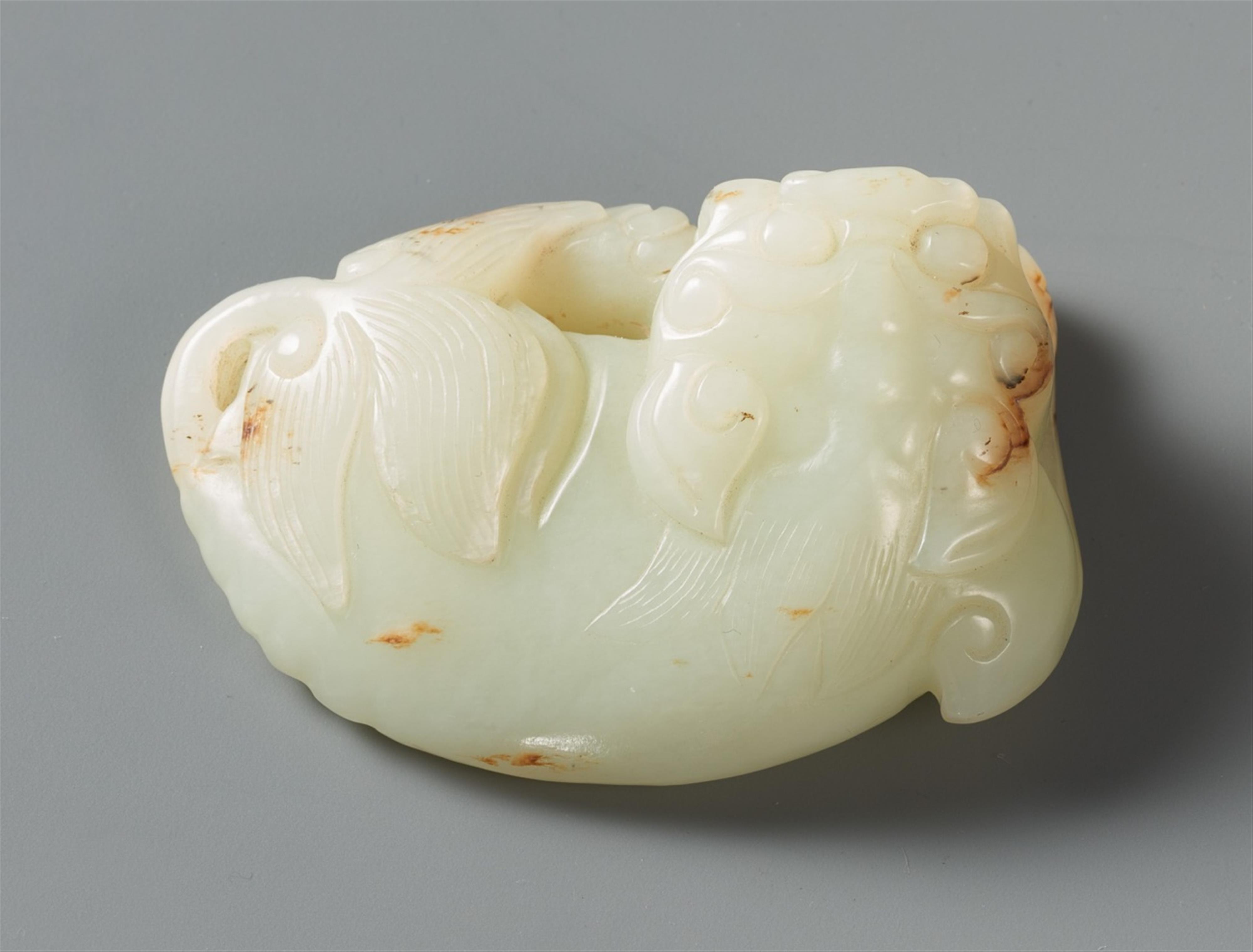 A celadon jade lion carving. Qing dynasty - image-2