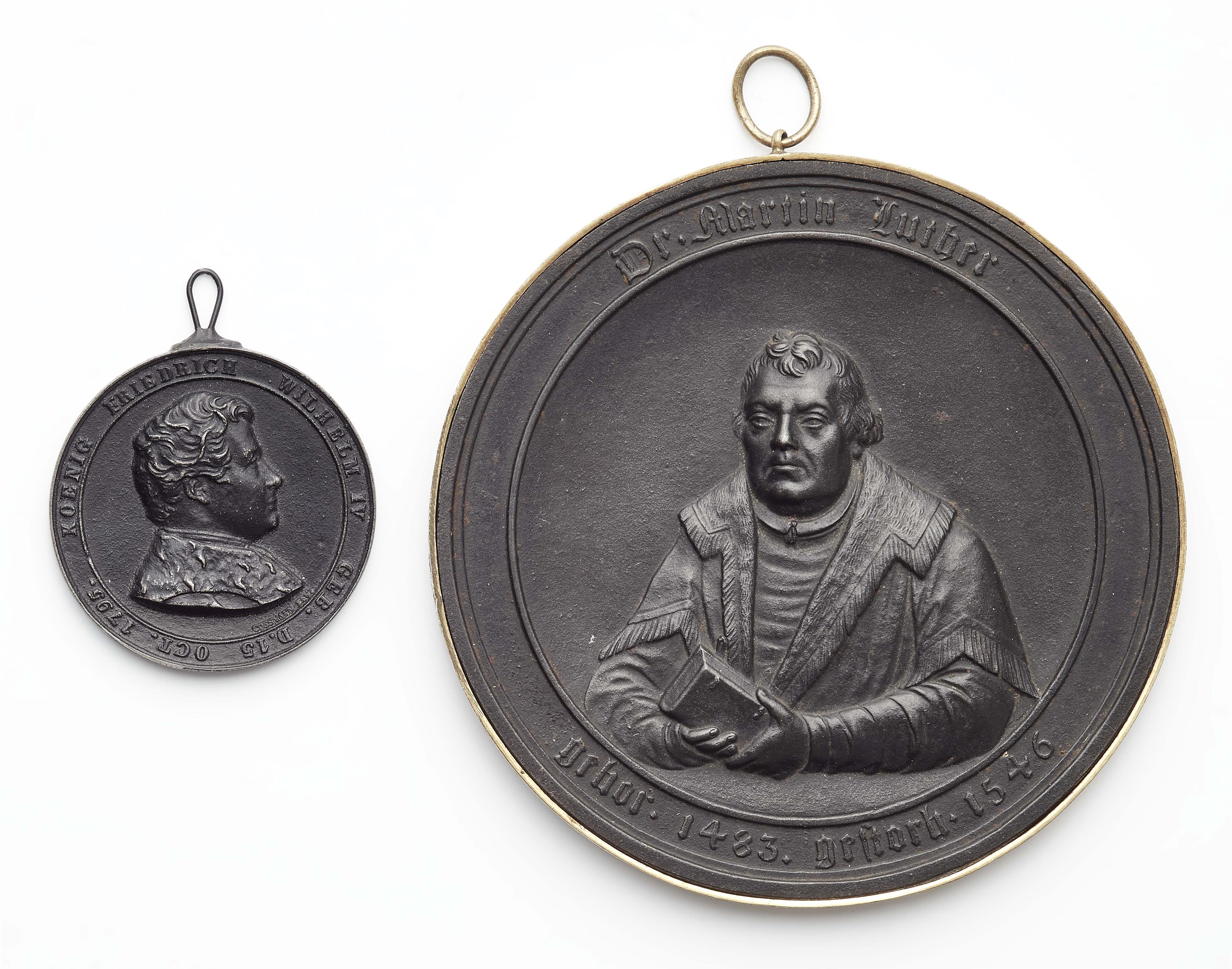 Two cast iron commemorative medallions - image-1