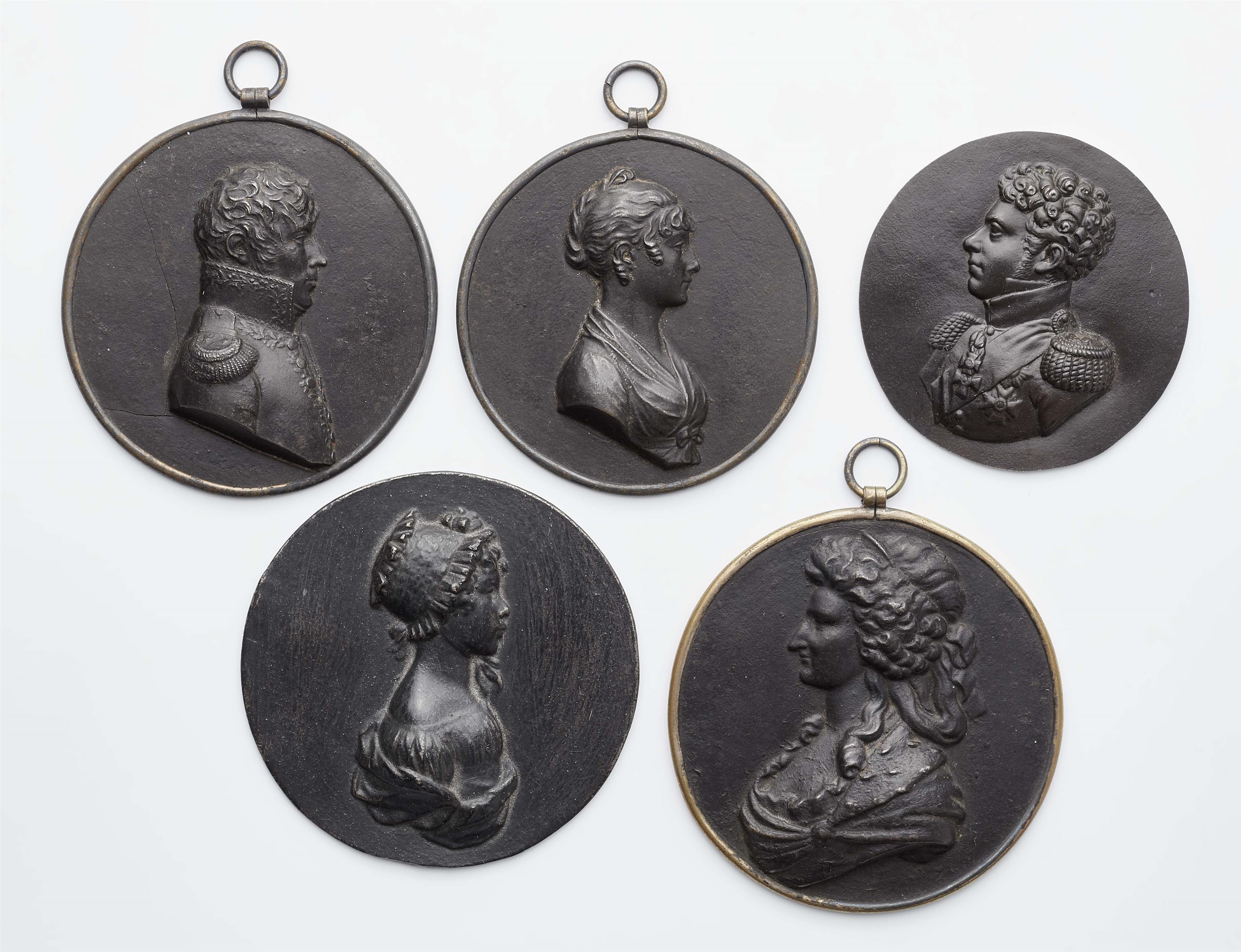 Five cast iron portrait plaques - image-1