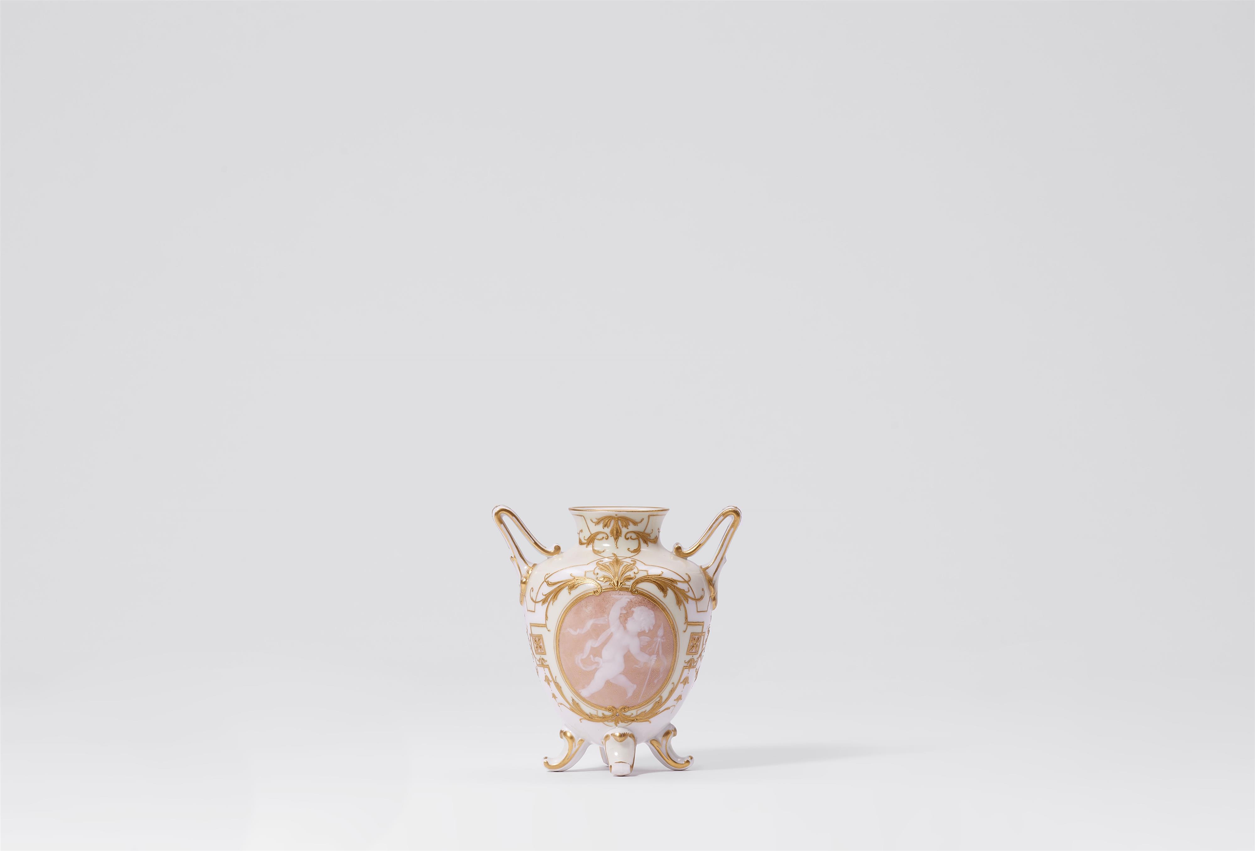 A small Berlin KPM porcelain vase with pâte sur pâte decor - image-1