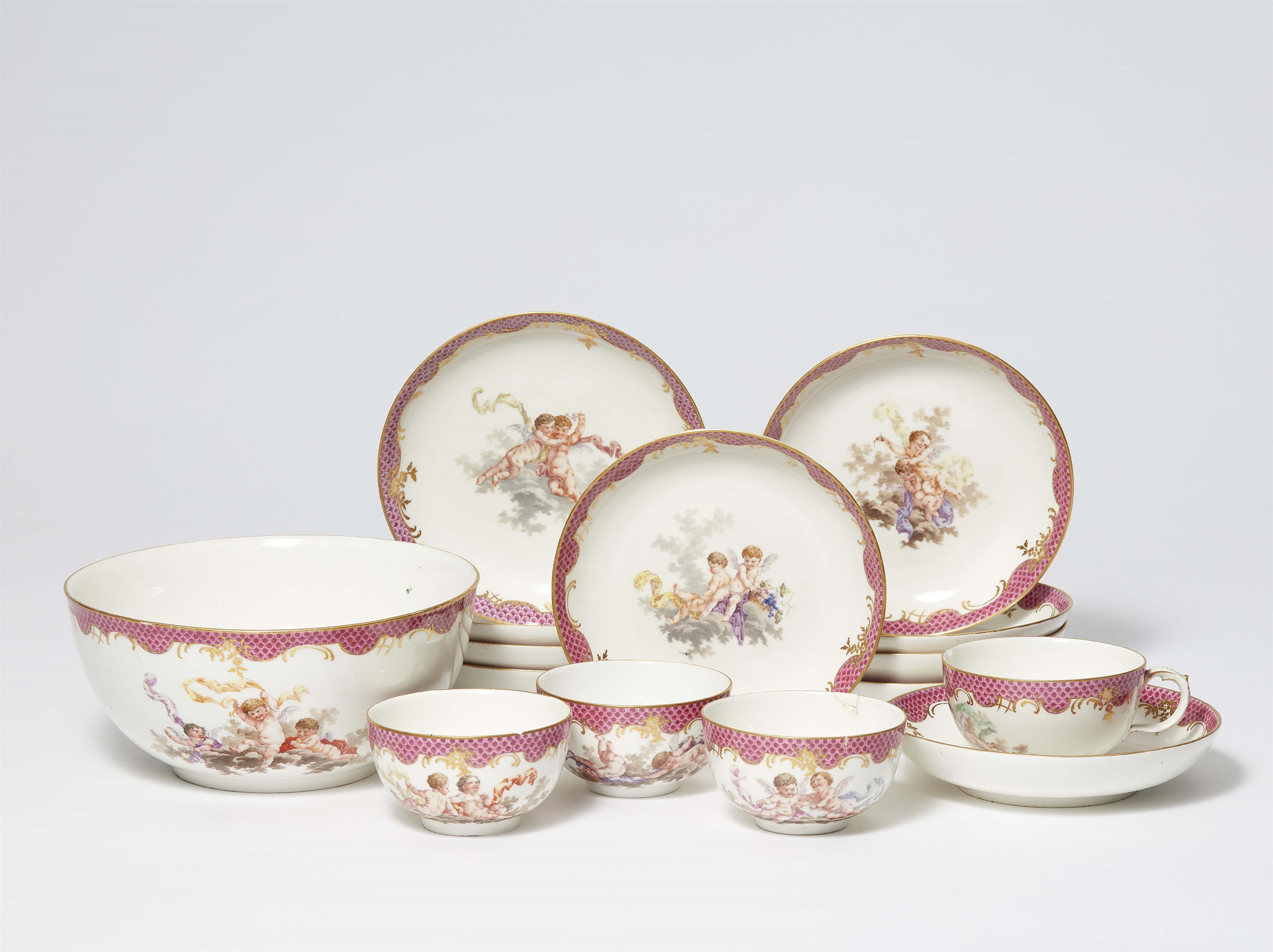Items from a Berlin KPM porcelain tea service with putti - image-1