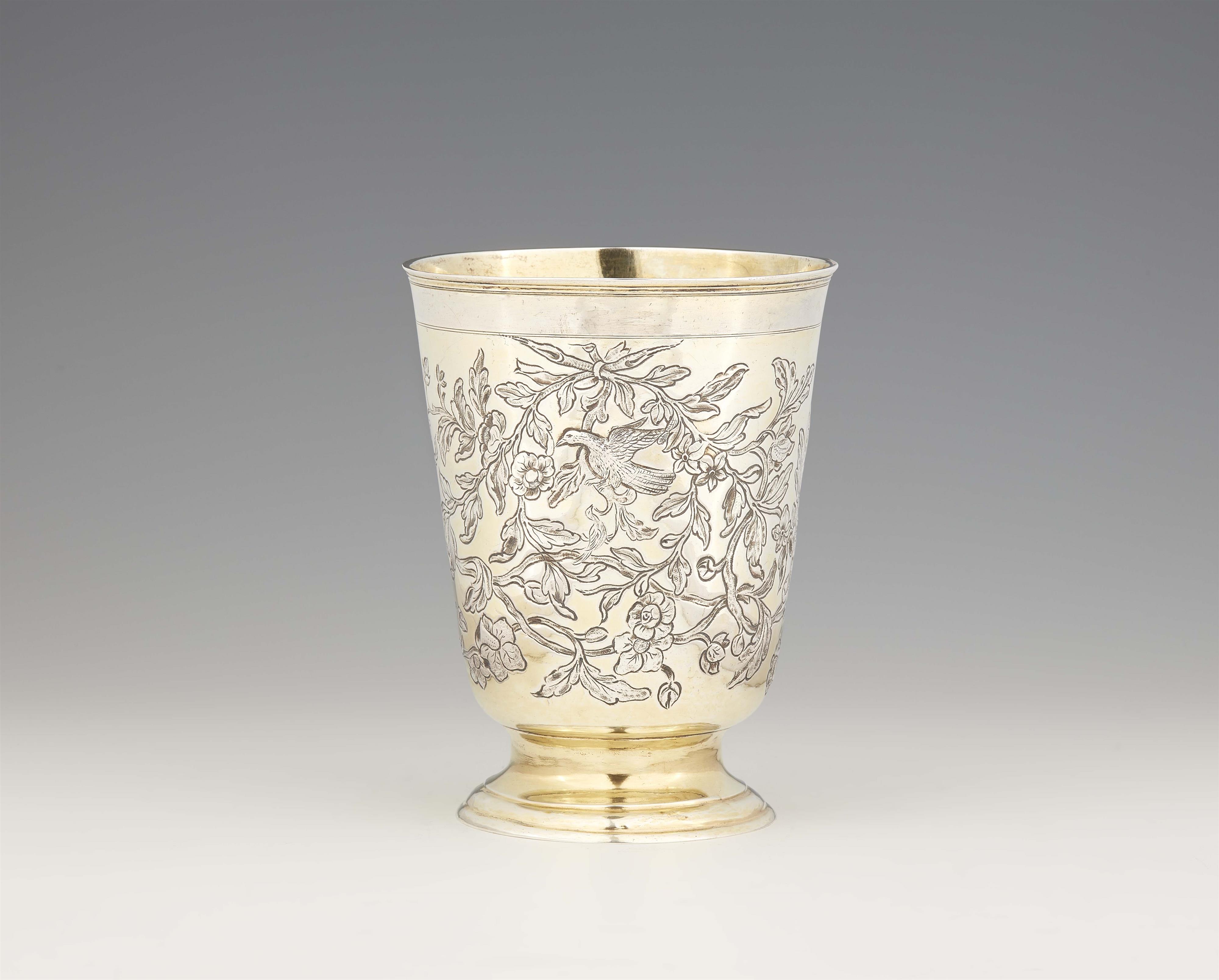 A large Rococo silver beaker - image-1