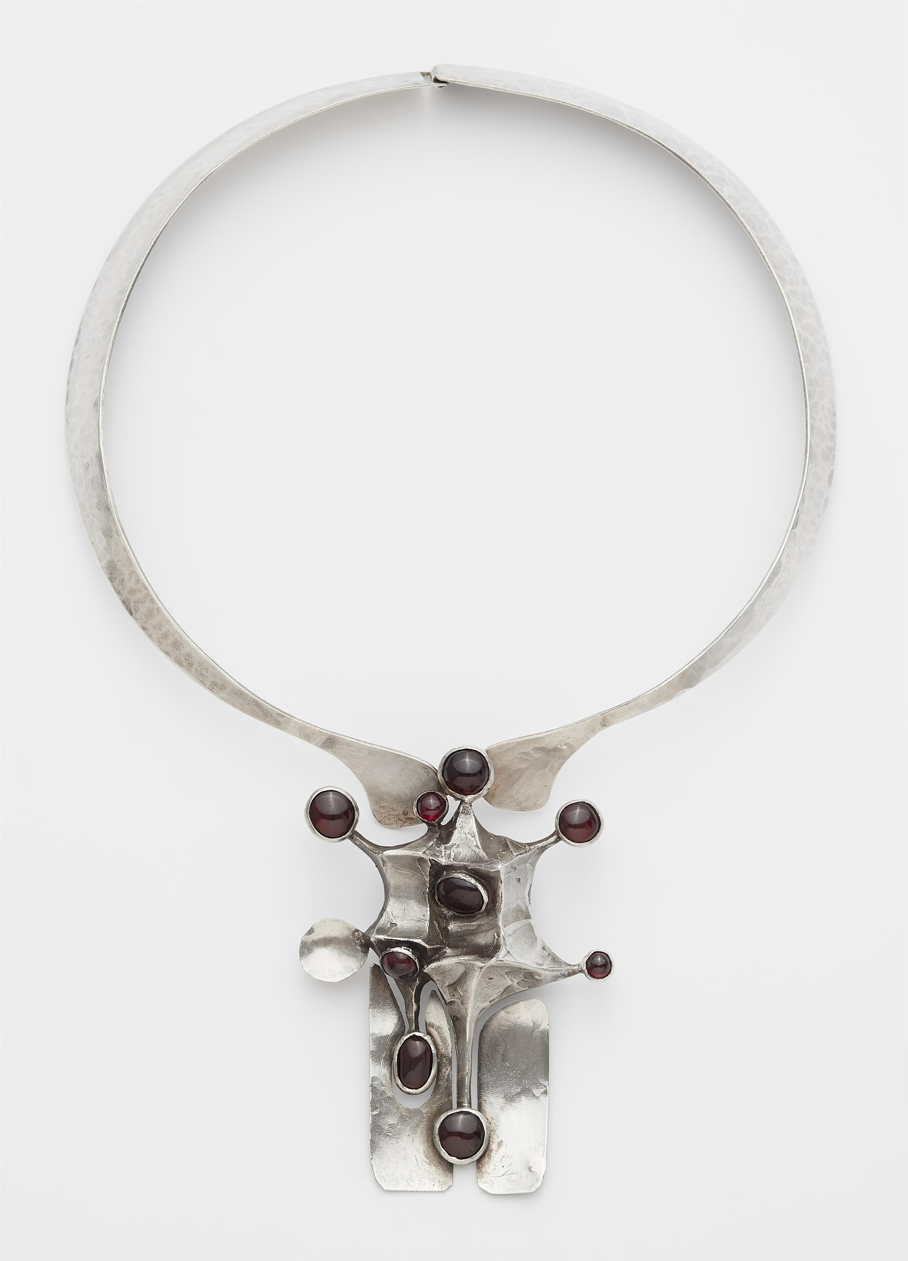 A Vienna silver necklace with a large carbuncle pendant. - image-1