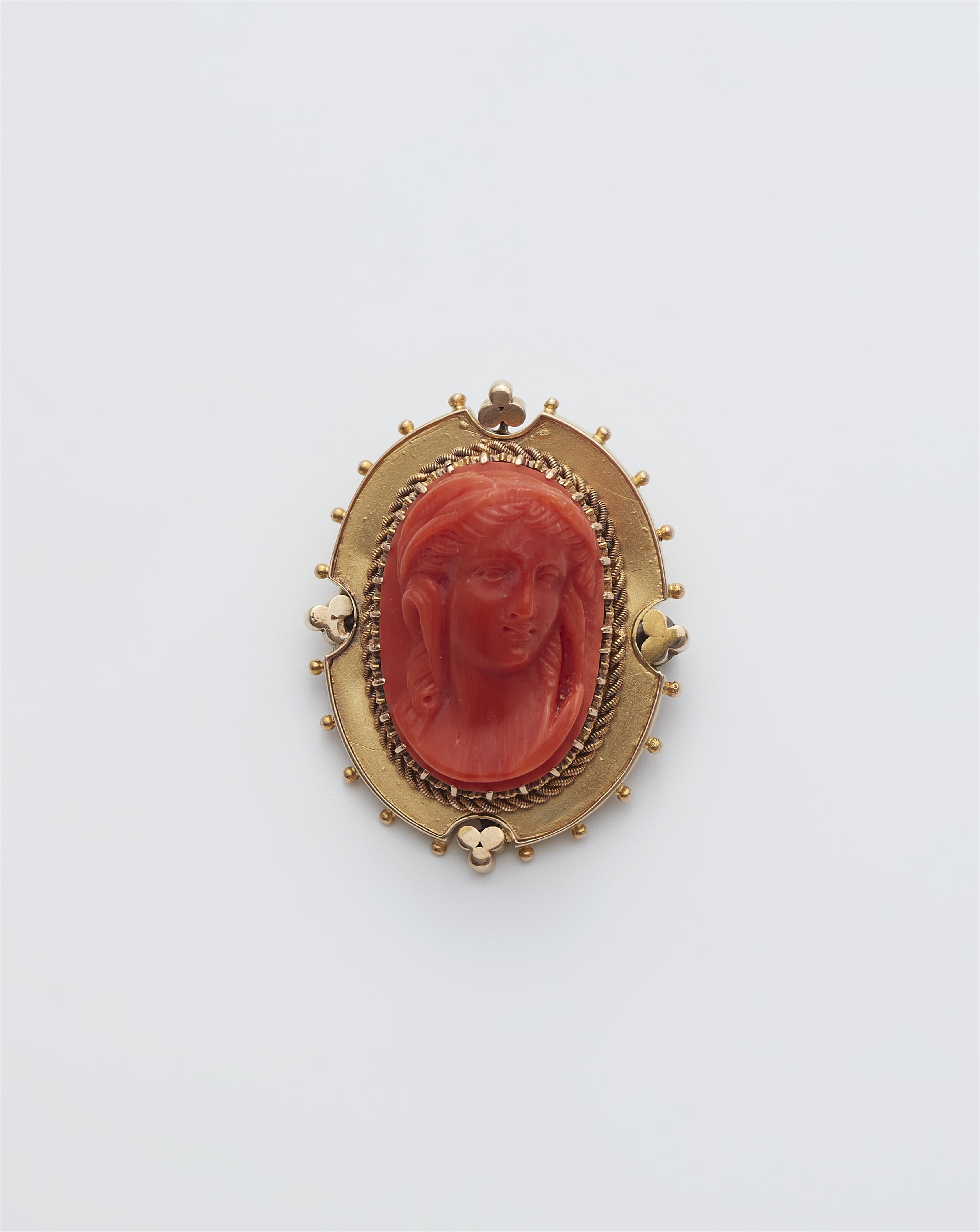 A probably Victorian 14k gold and red Sicilian coral cameo brooch. - image-1