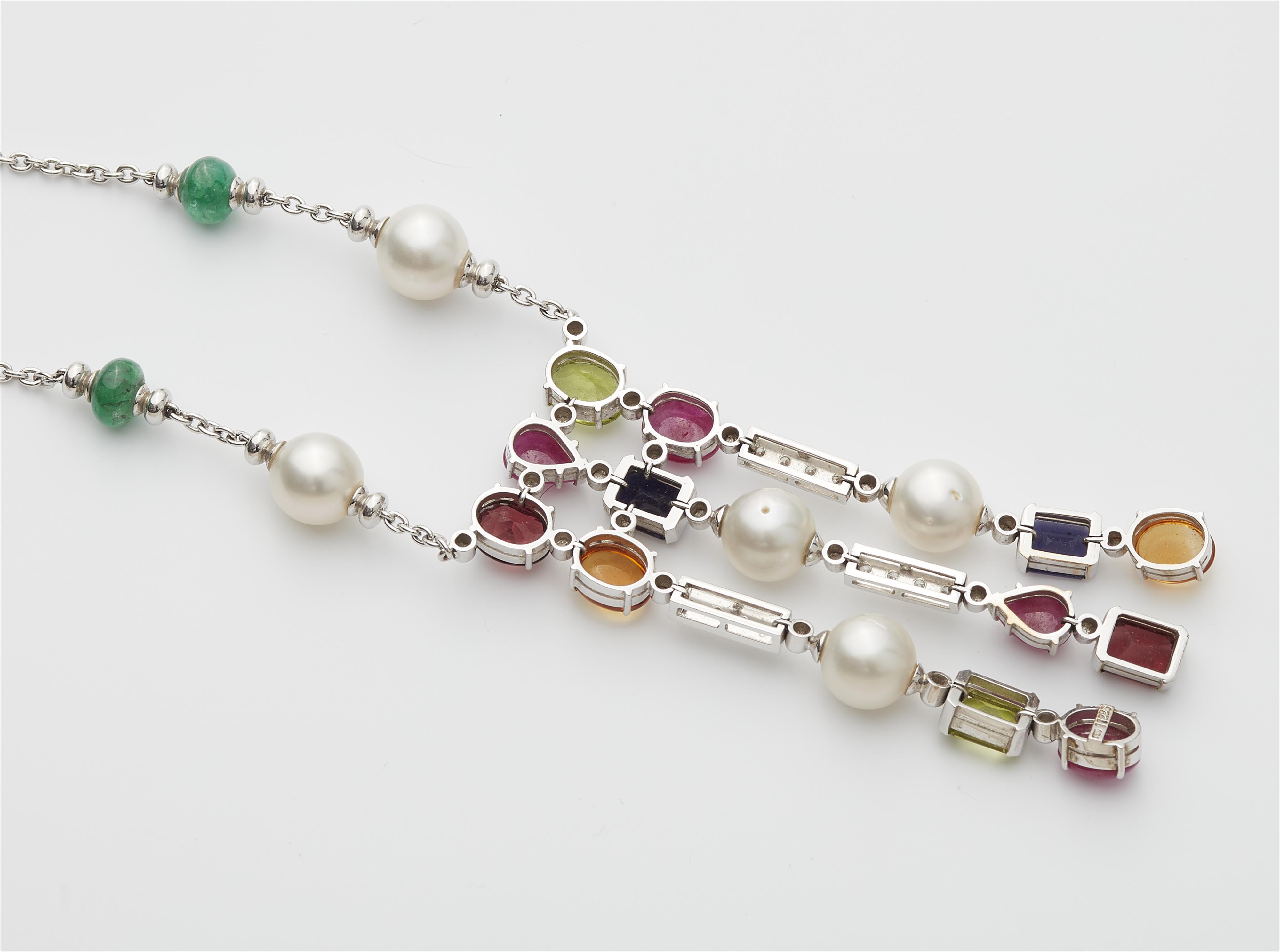 An 18k white gold coloured stone, diamond and South sea pearl pendant necklace. - image-3