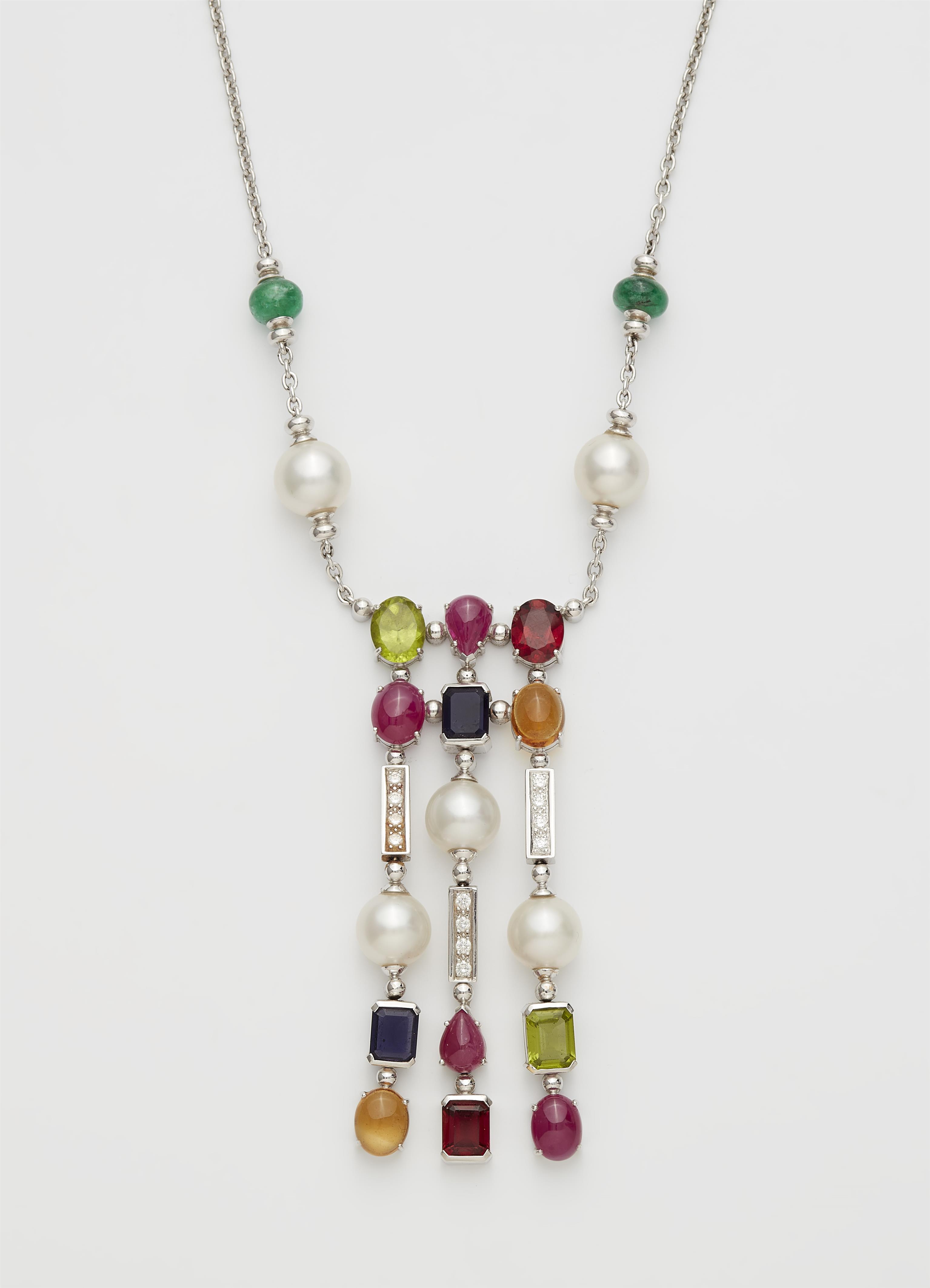 An 18k white gold coloured stone, diamond and South sea pearl pendant necklace. - image-1