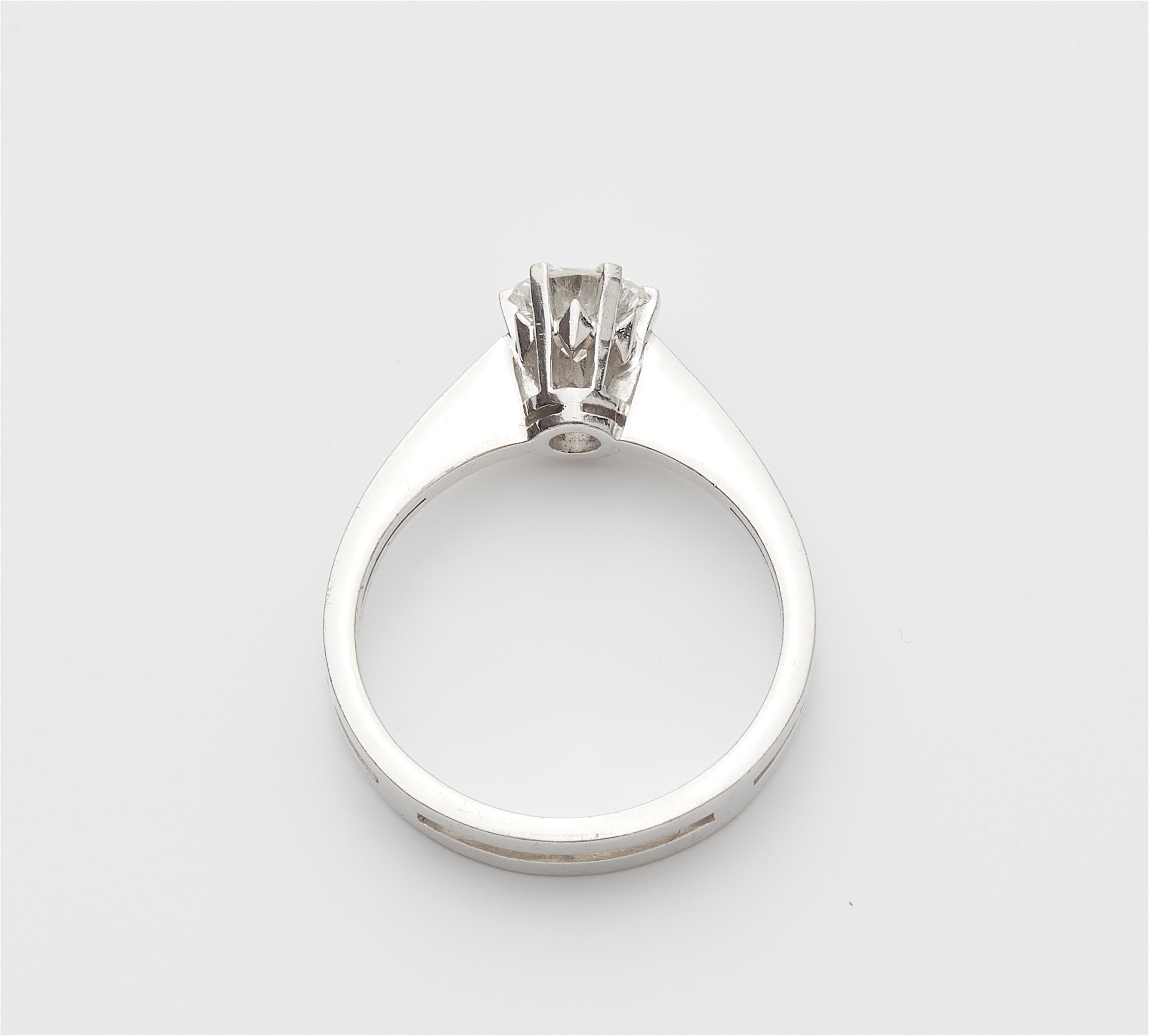 An 18k white gold and diamond solitaire ring. - image-2
