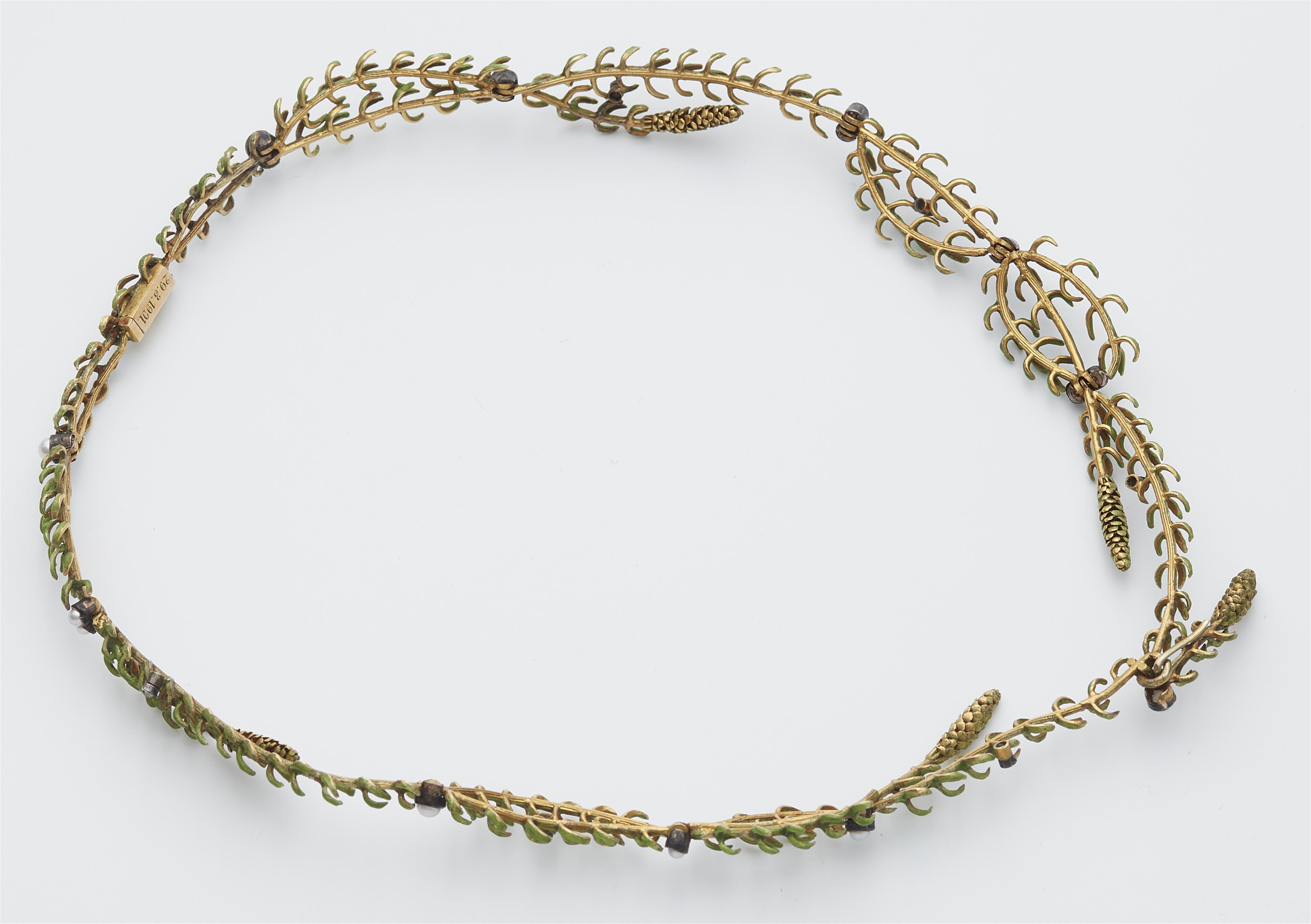 A 14k gold and translucent enamel pine cone necklace. - image-2
