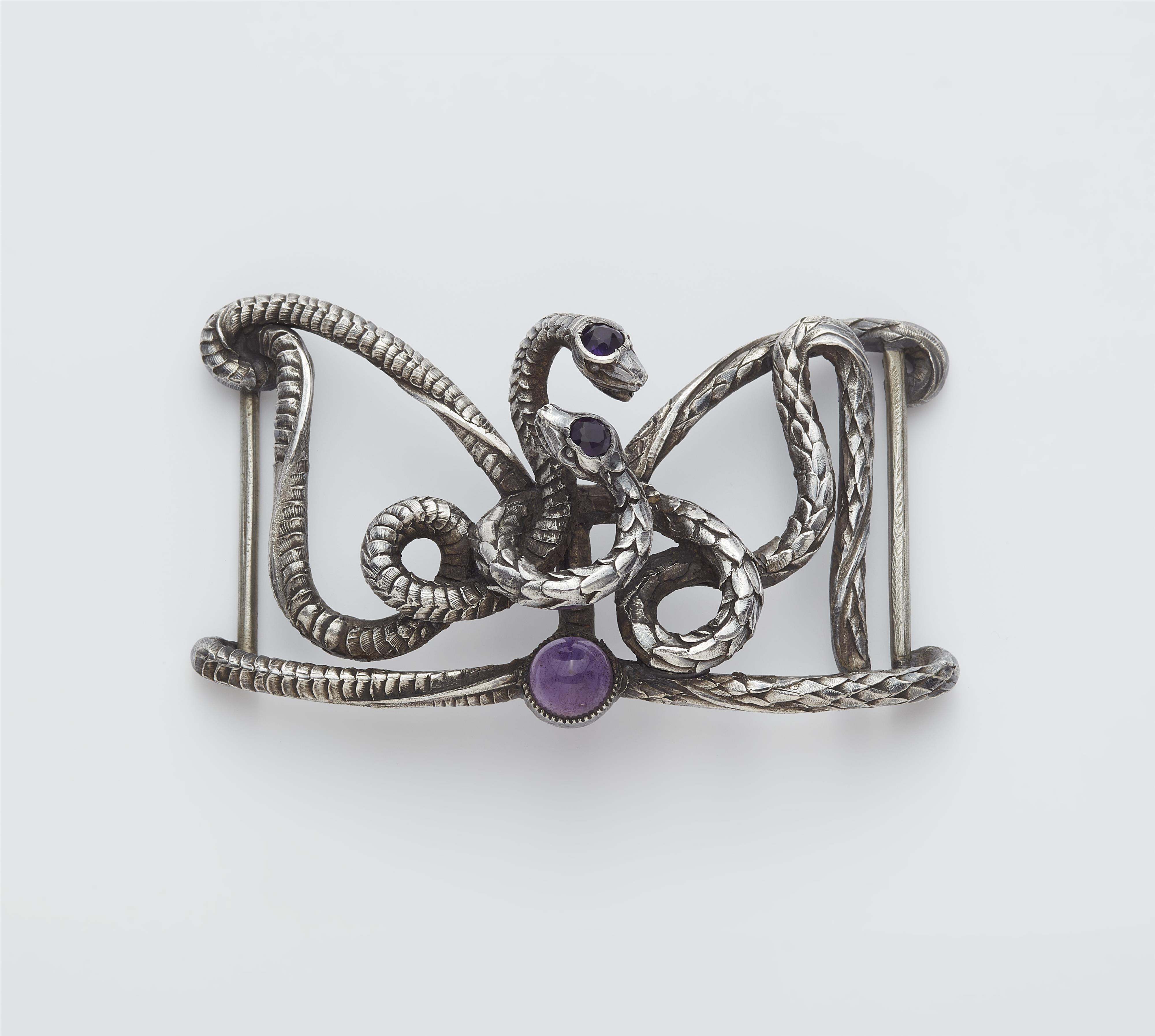 A Belgian silver and amethyst Art Nouveau belt buckle. - image-1