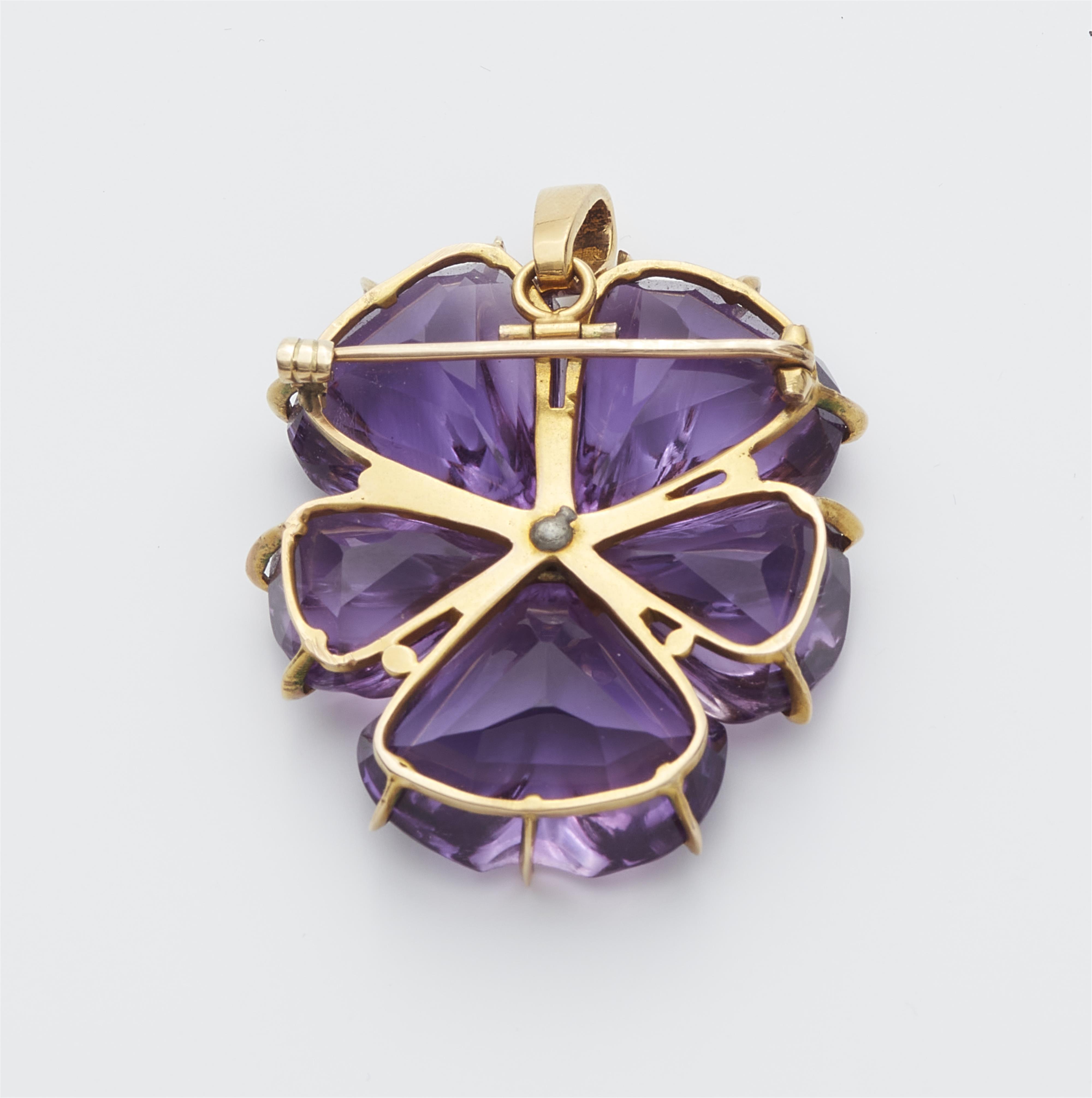 An 18k gold and carved amethyst pansy pendant. - image-2