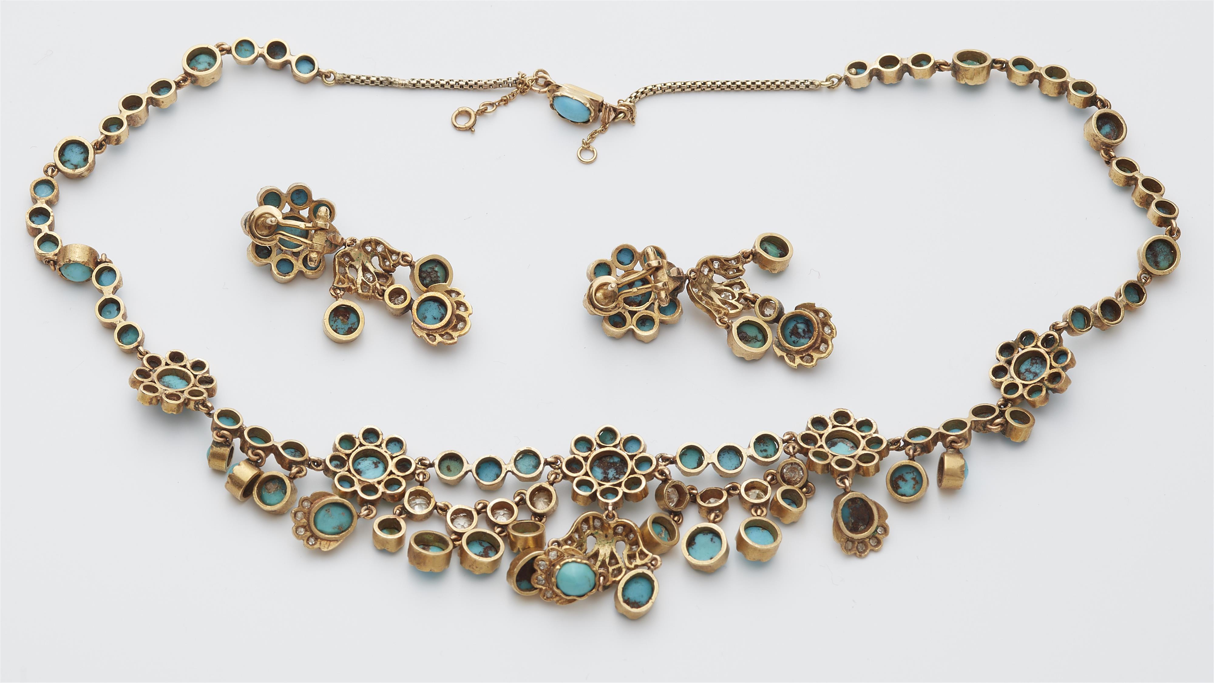 An 18 kt gold diamond and turquoise suite comprising a fringe necklace and a pair of pendant earrings. - image-2